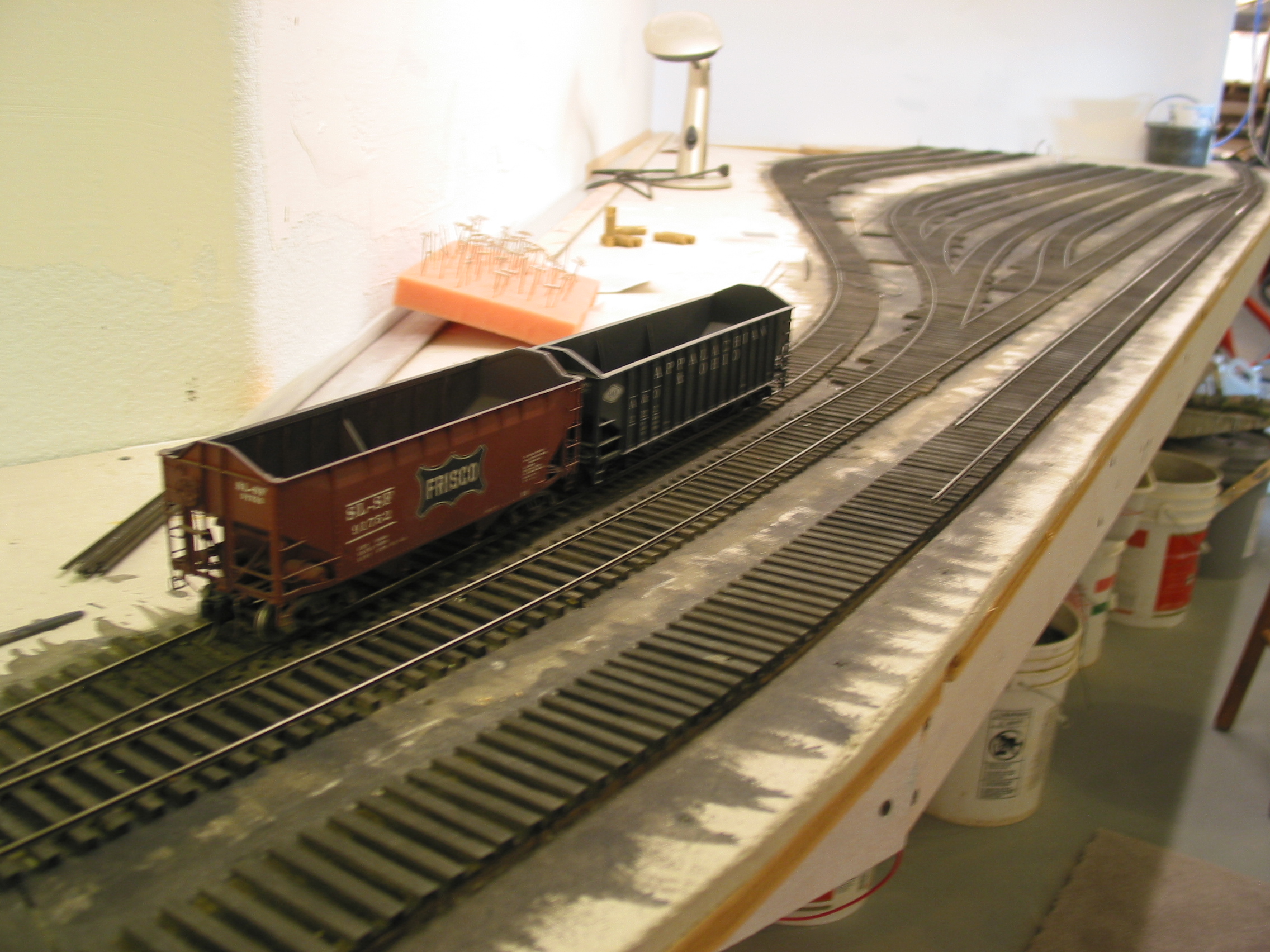  A pair of hoppers test early trackwork and provide inspiration for the project. Vince is a Frisco modeler. 