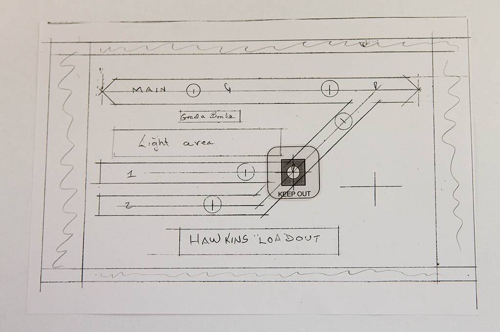  Panel track diagram was done on paper with T-Square and angle tools (OLD school, like me), Leave room for the wood attachment brackets on each side! Make a photocopy! Trim and cut plex on table saw to match. Use spray glue to attach paper diagram to