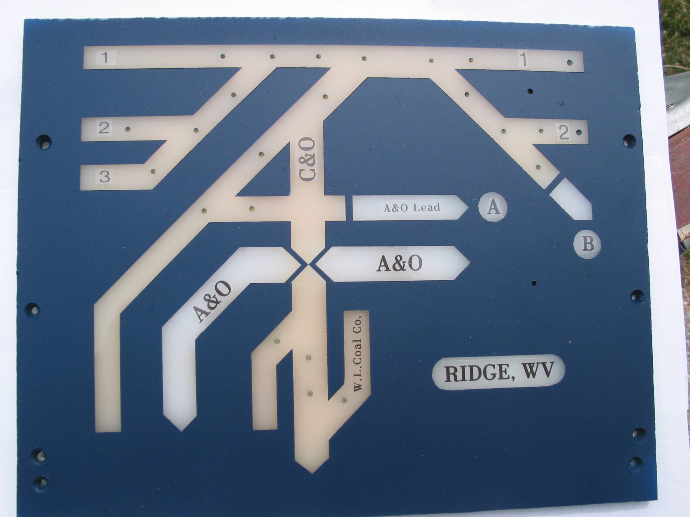  What do you do when there’s another RR’s tracks on the same panel? Color differential. The Ridge panel features lots of C&amp;O trackage while the A&amp;O merely passes thru. This panel is ready for hole enlargement. 