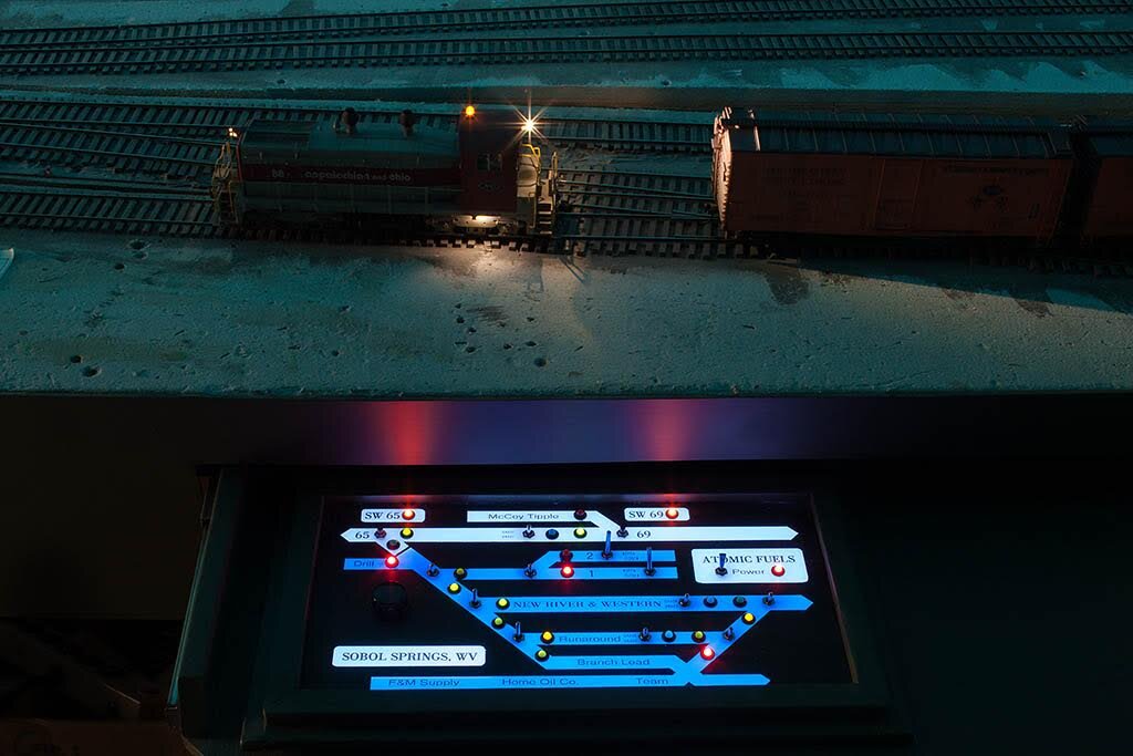  Night ops at “The Springs”. Note that Atomic Fuels has its controls also on the panel. And that the Springs is mostly New River &amp; Western trackage, and thus ‘blue’ to distinguish it from the A&amp;O. 