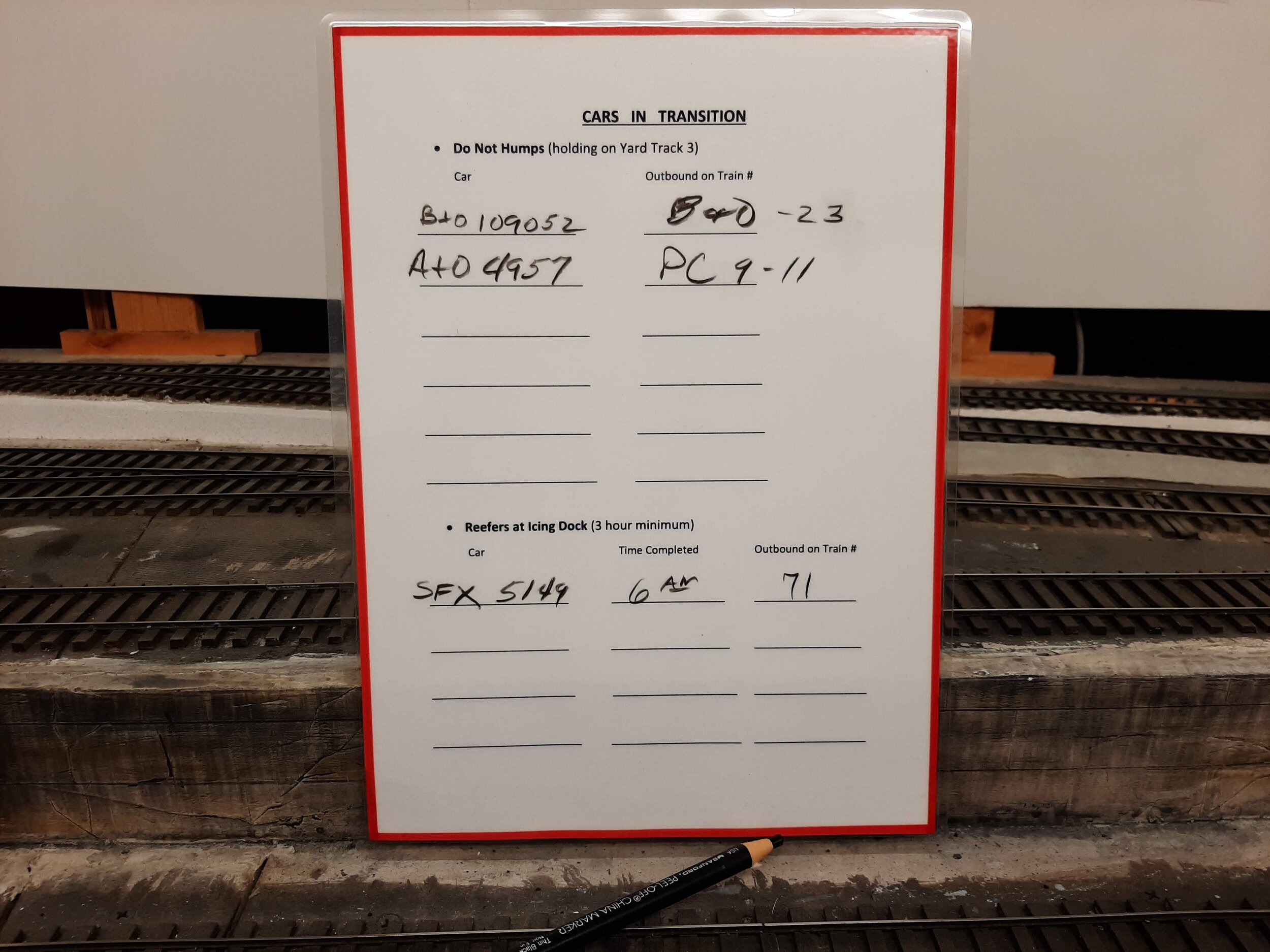  Cars being held in Havens for future train movement are noted in grease pencil at the YM workstation. It’s his responsibility to get them on their assigned train. Reefers pulled off for icing are likewise noted. 