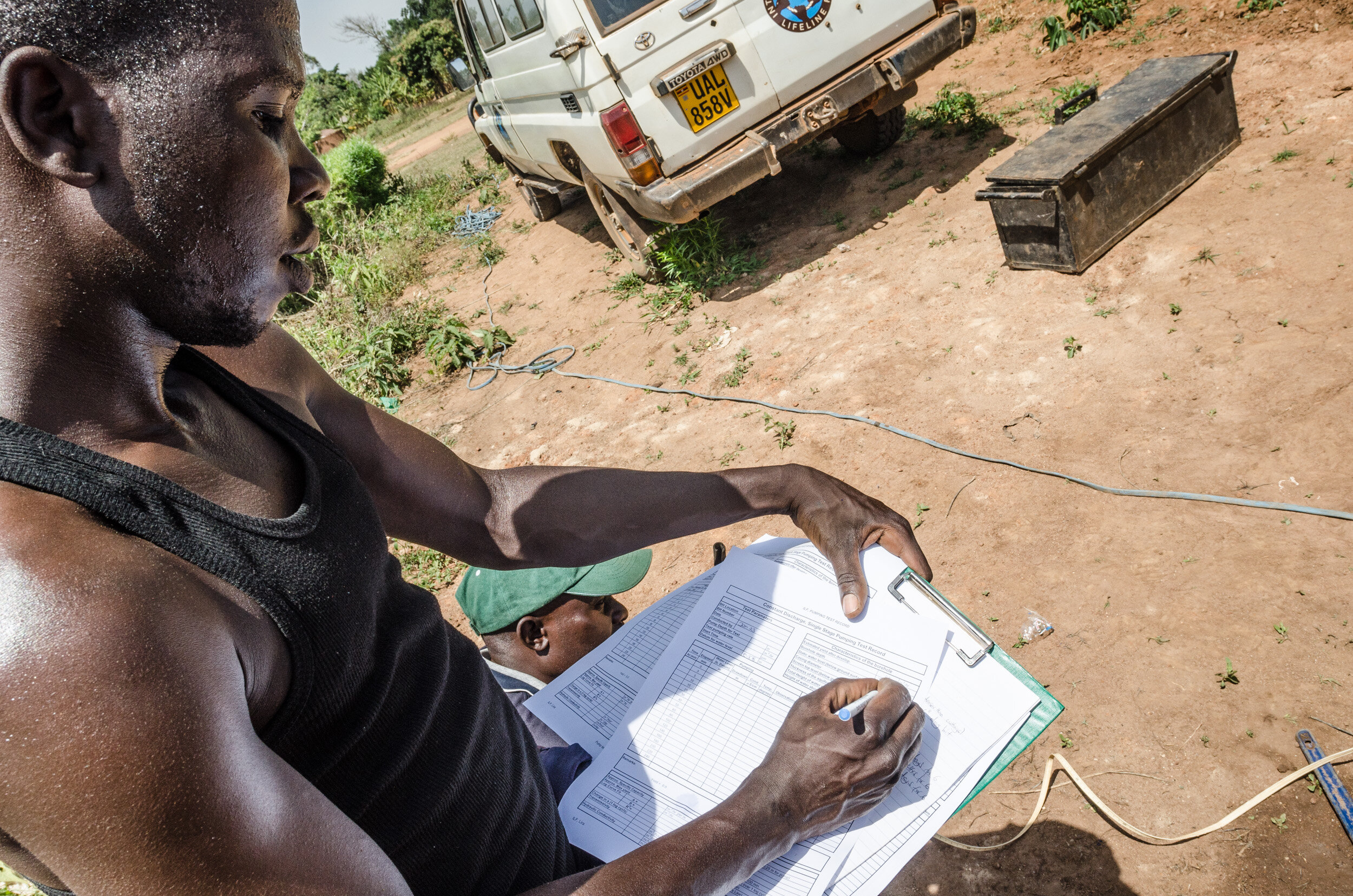 When the bore hole is deep enough the well building crew gets to work. (Copy)