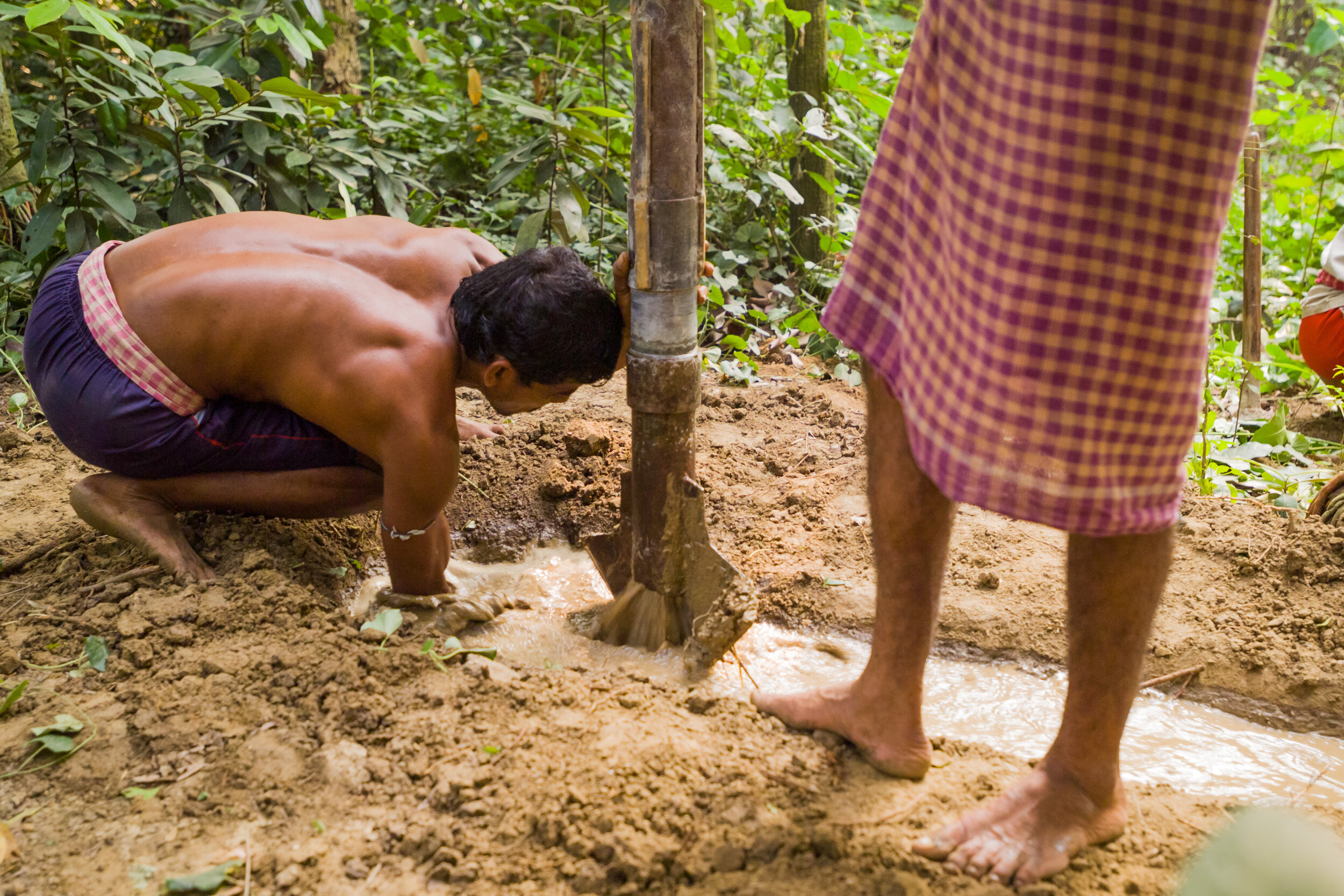 Bore holes are dug with a blade, turned by man power and aided by flowing water. (Copy)