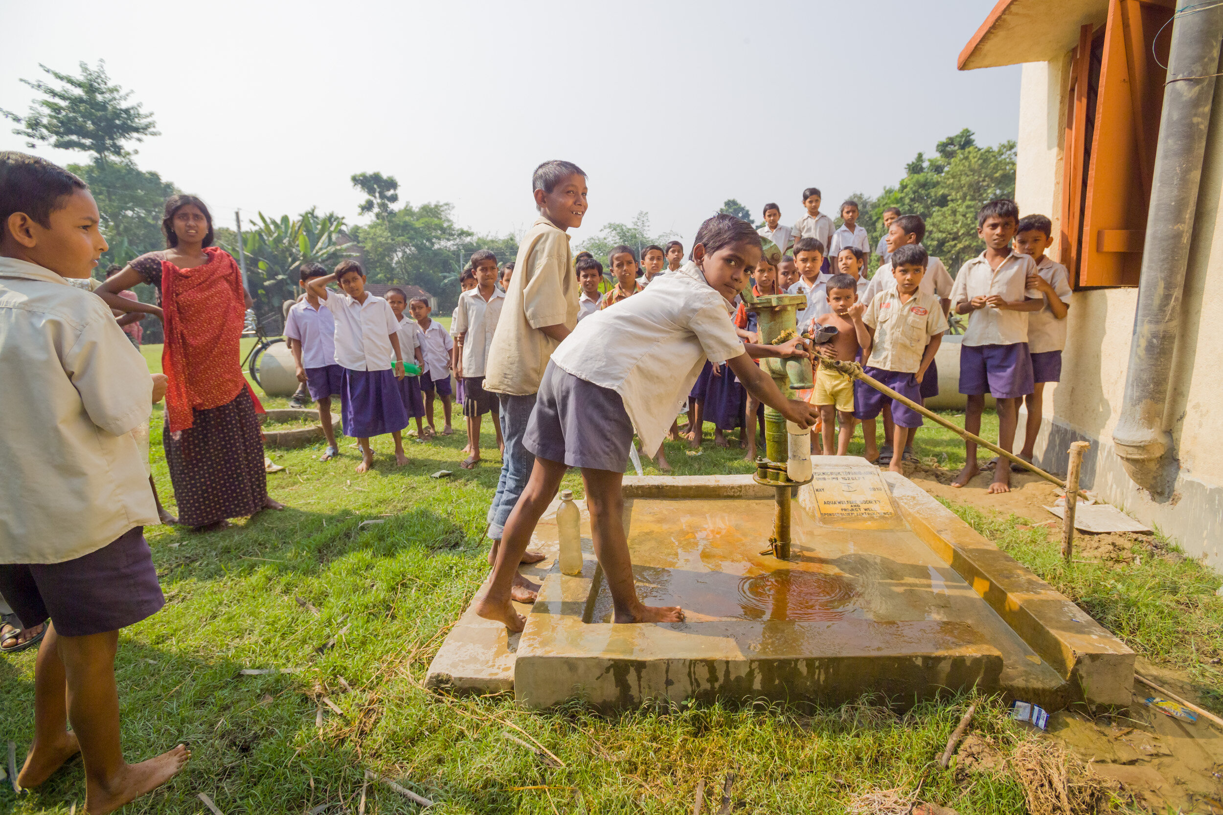 Once in place the kids do what kids do. The water is available for the school and the local community. (Copy)