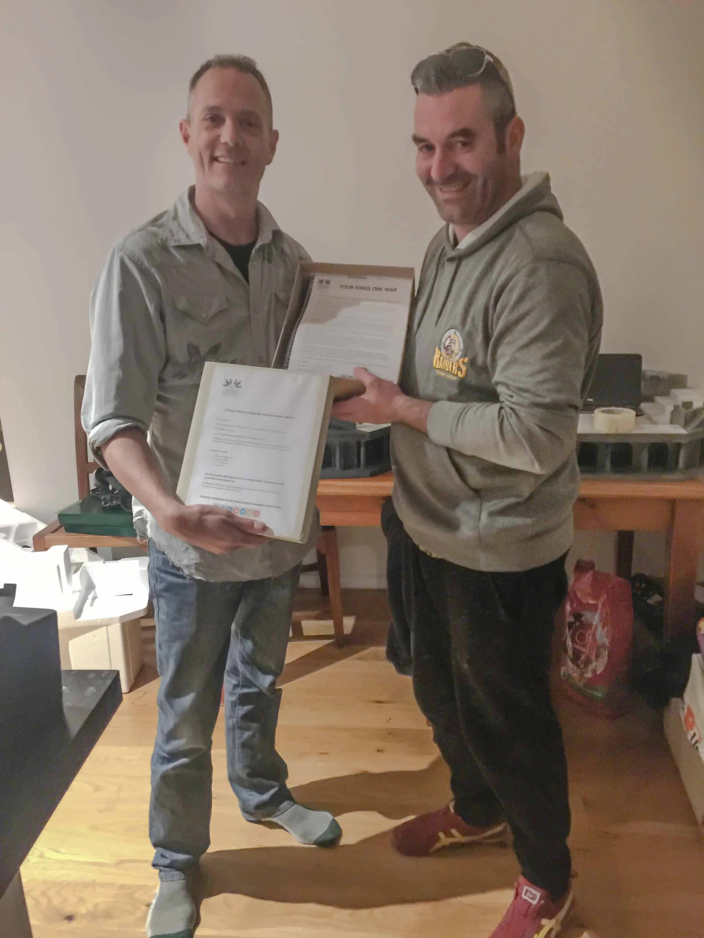 Glyn and Garth with the pieces, rules and intro letter for Richard.jpg