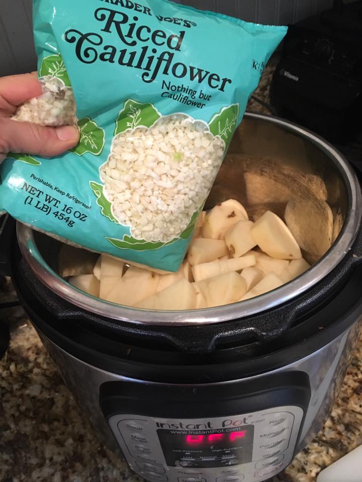 Adding a bag of riced cauliflower to an Instant Pot potato soup recipe! I like to add it in when the potatoes are slightly cooked because it steams the cauliflower just enough for it to combine easily.