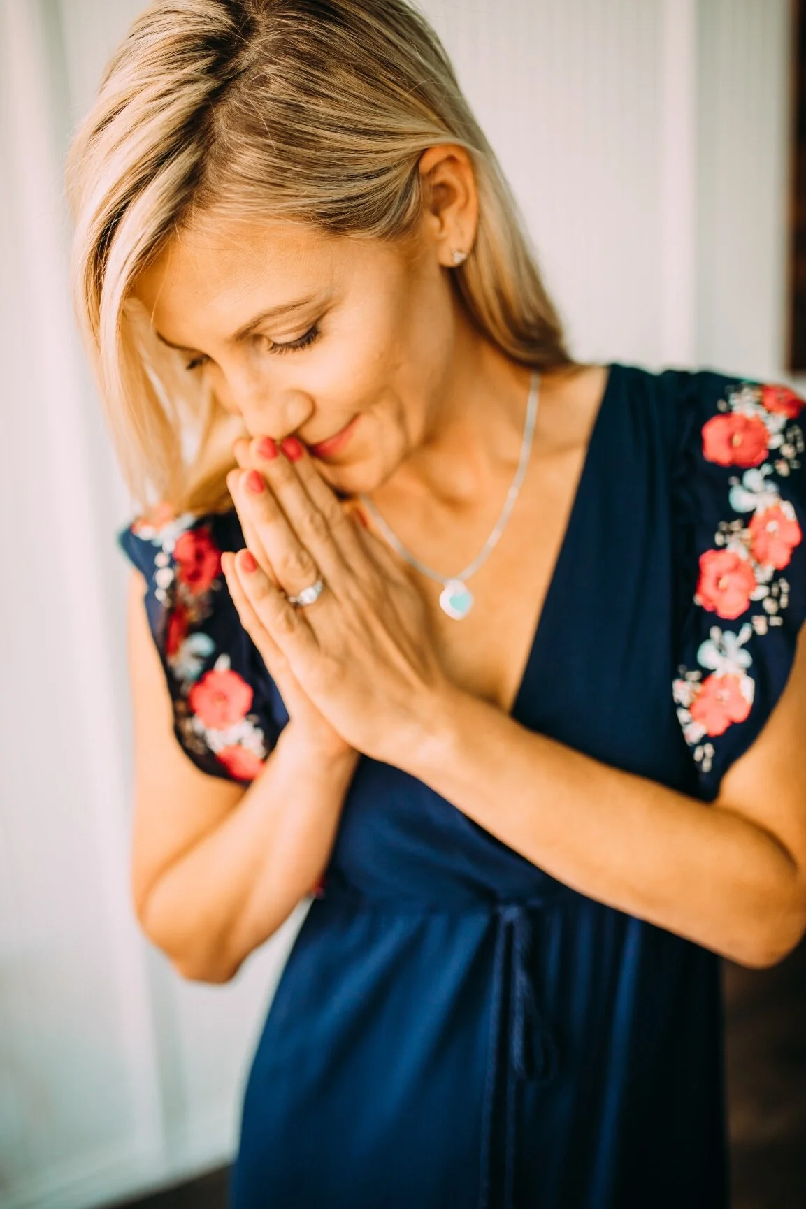 Pray hands looking down 2.jpg