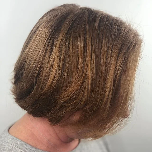 My mom was in town this week (helping me wedding dress shop!) and volunteered to let me play with her hair. For ease of maintenance we put some copper-red highlights in her hair to blend some silvery blonde that has popped up in recent years and make
