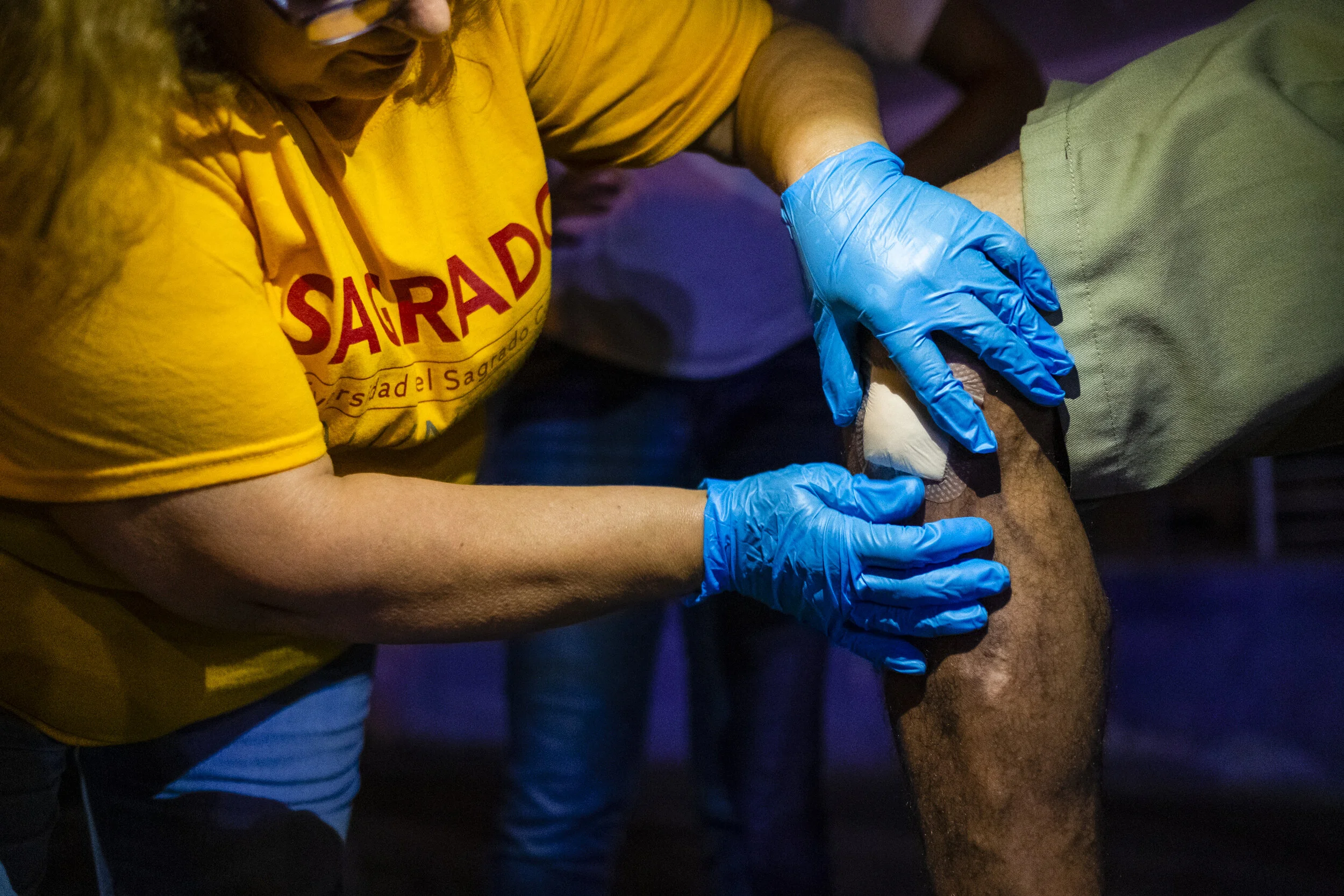  A visiting nurse from Spain volunteers to clean and bandage sores resulting from opioid injections, Fentanyl in particular. 