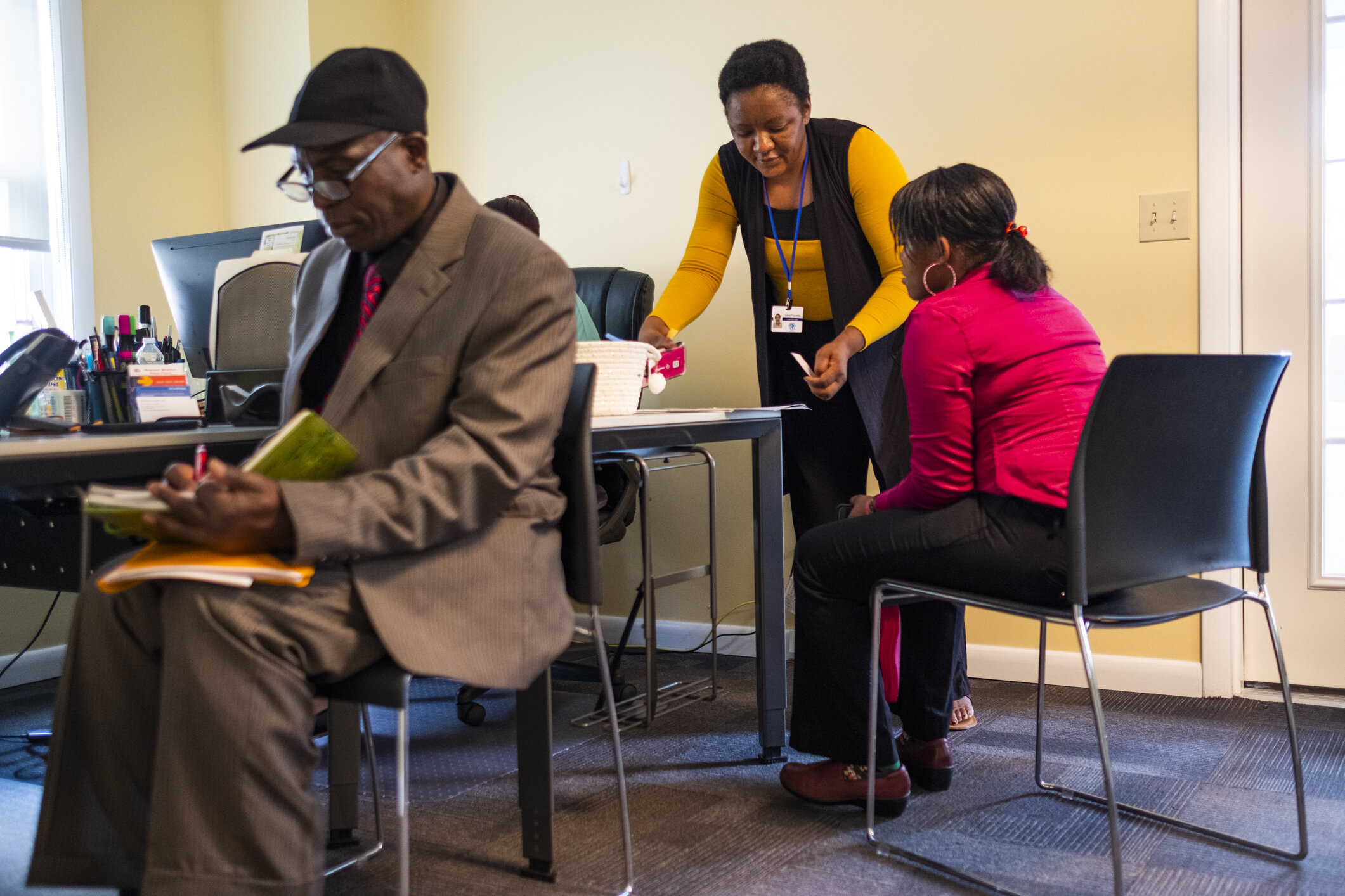  Isabel, the case management director of the RDC,  guides a small group during a job placement consultation. 