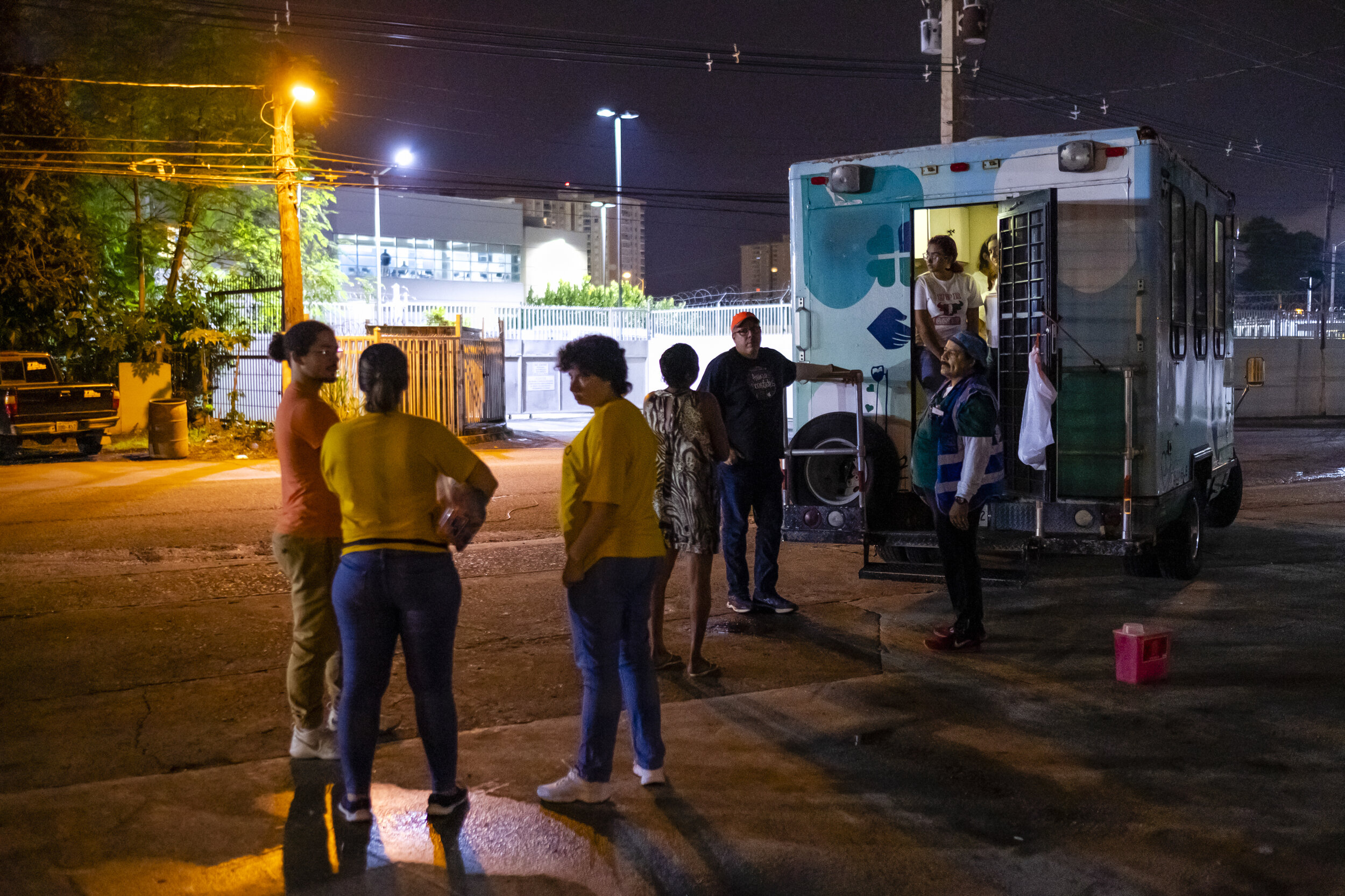  In underprivileged neighborhoods of San Juan, volunteers of the program Operación Compasión await for injecting drug users who will receive medical attention and the opportunity to exchange syringes. 