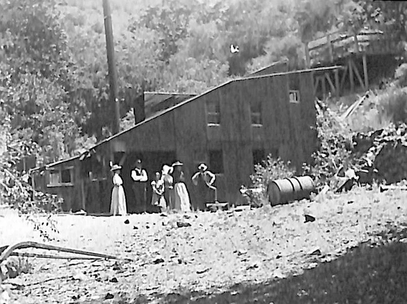 No photos seem to have been taken during the boom days in Silverado (Anaheim’s only photographer set out to visit the mines, but his buggy rolled off the road, he broke his arm, and never returned). So the photos we do have all show later buildings and work. This photo from Jim Sleeper’s papers at UC Irvine seems to be the oldest mill scene. He dated it around 1900, so it may be Marshal Dunlap’s mill from the 1890s.