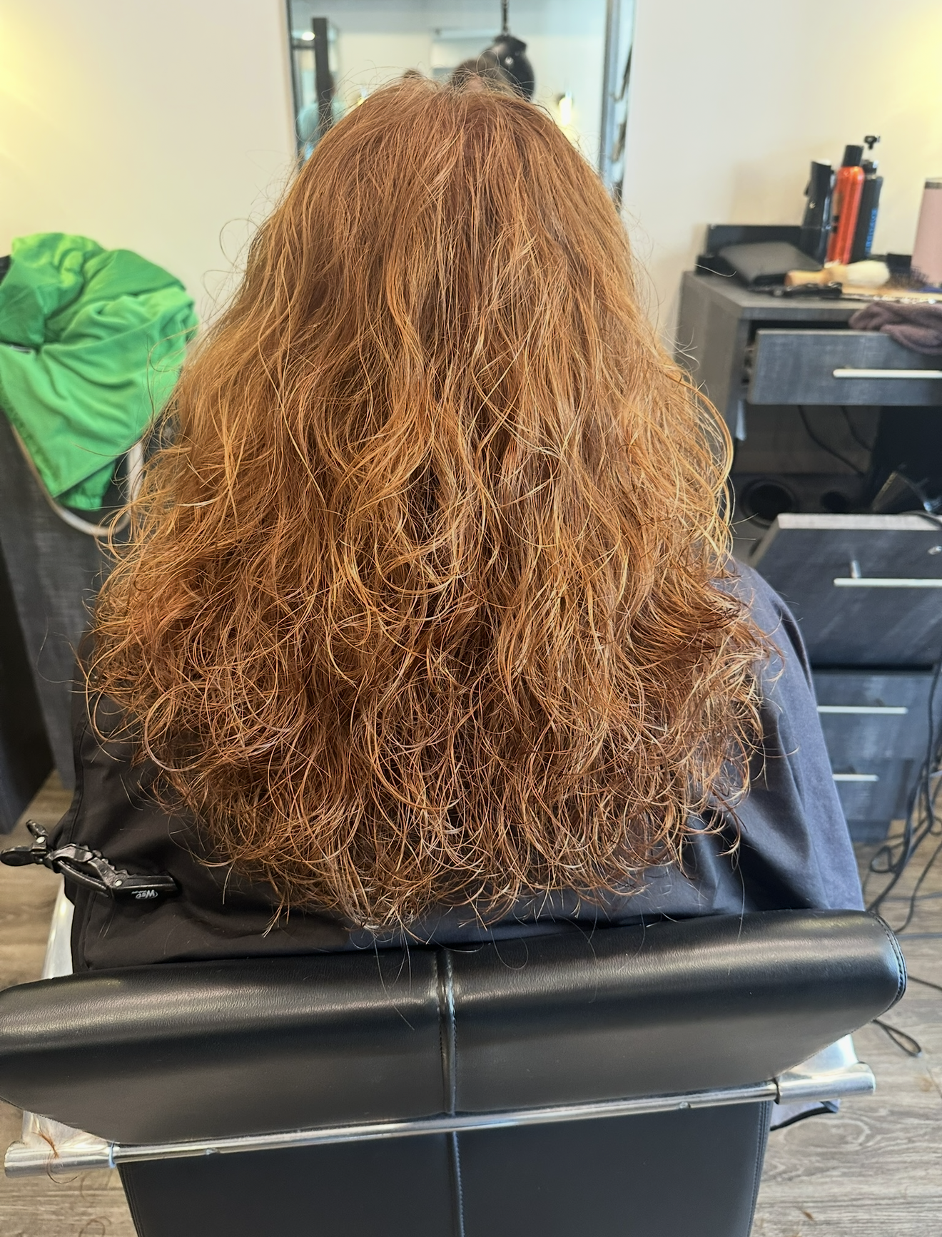 Copper hair color on natural curls at Salon Sapphire in Clarendon Hills IL