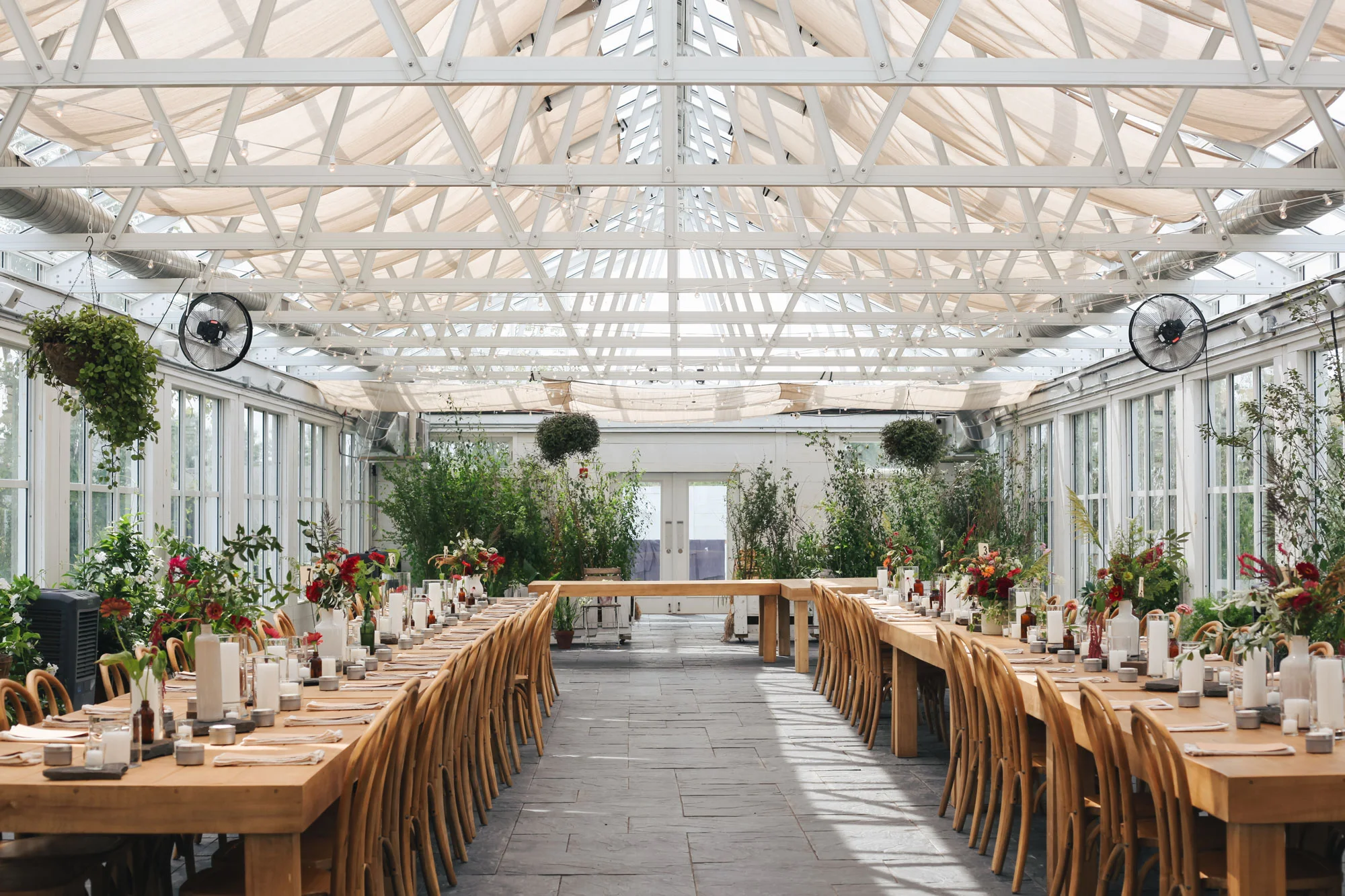 The Greenhouse at Audrey’s Farmhouse in Gardiner, NY with flowers by Fern + Fawn .