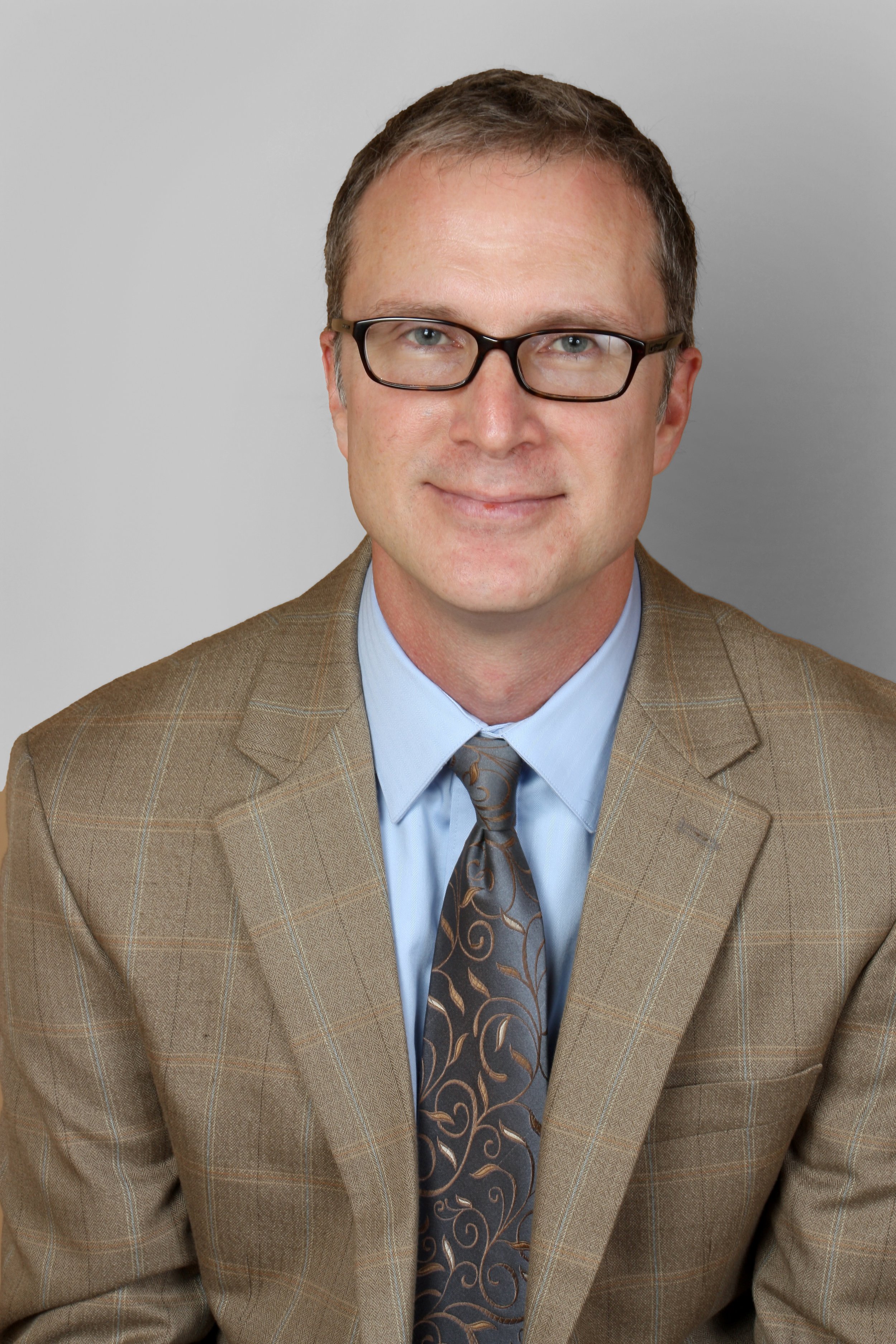 man with glasses and tie.jpg
