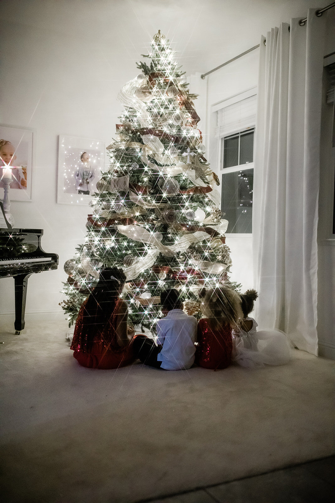 kids around Christmas tree
