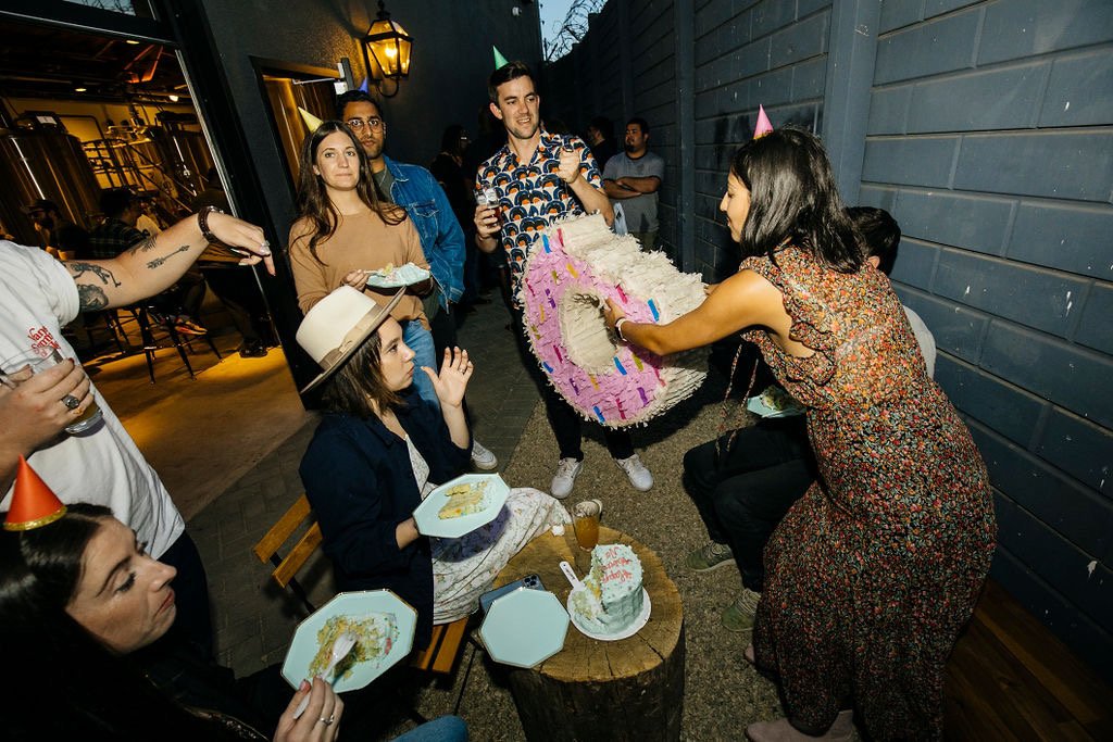 A birthday party with a donut pinata