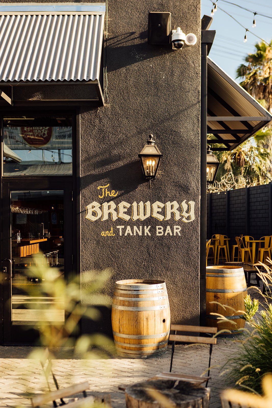 The brewery and tank bar sign on the wall