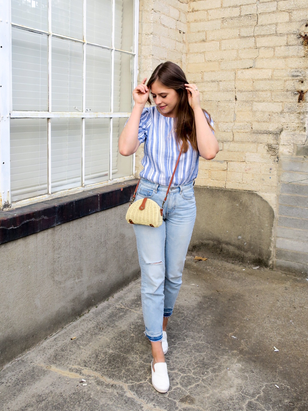 cabi top paired with jeans.JPEG