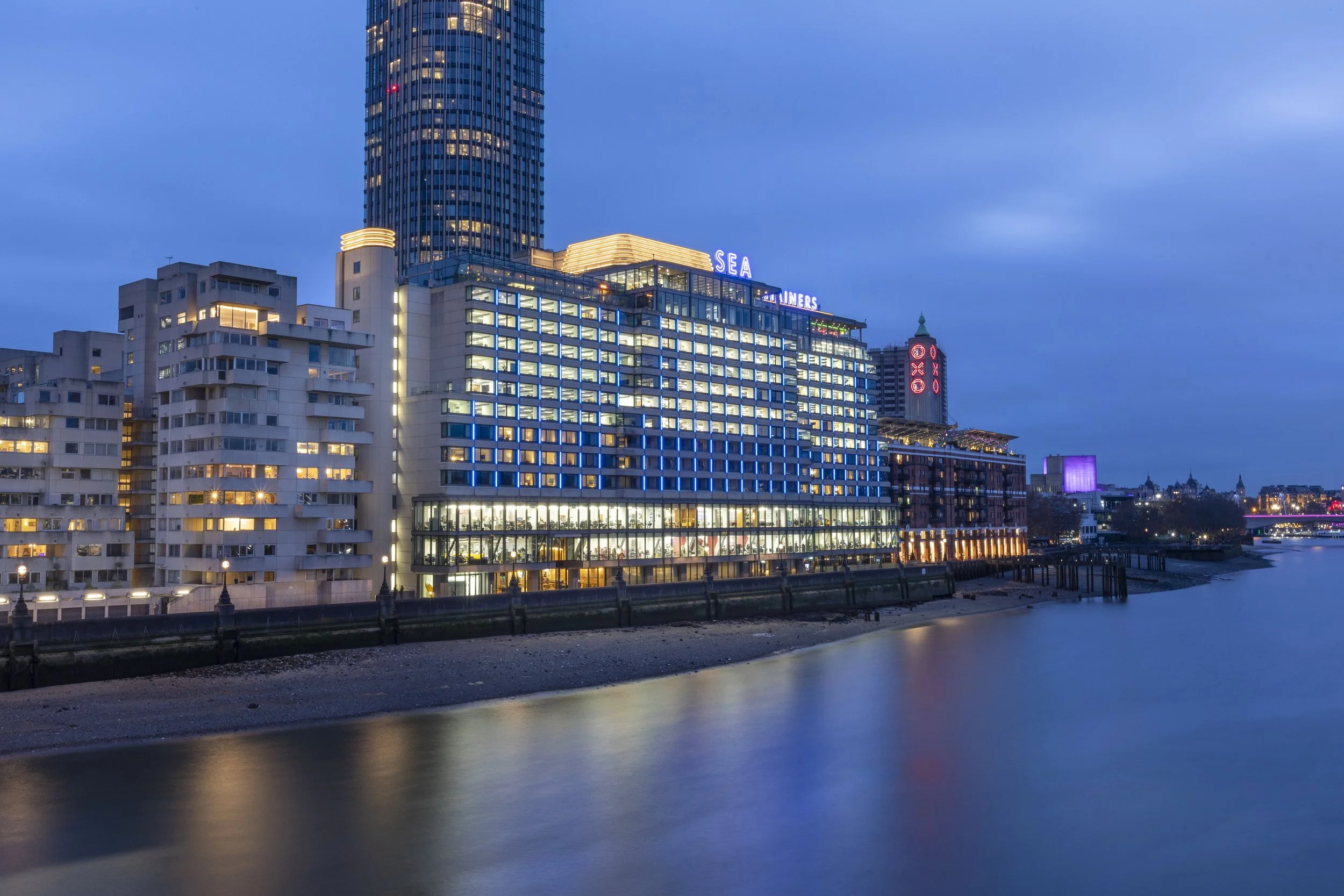 it is an architectural photograph of the hotel exterior Sea Containers in London on twilight lighting