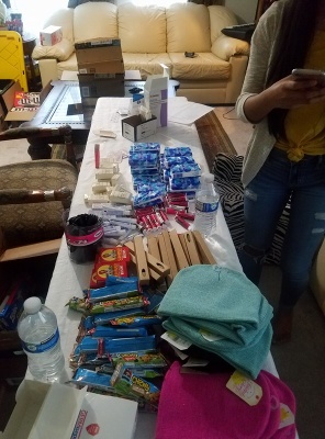 A lovely assembly line, laid out by Lily & Eanna, displaying supplies from Northwest Hospitality (including many of our ecofriendly additions) as well as supplies gathered from other sources by these resourceful ladies.