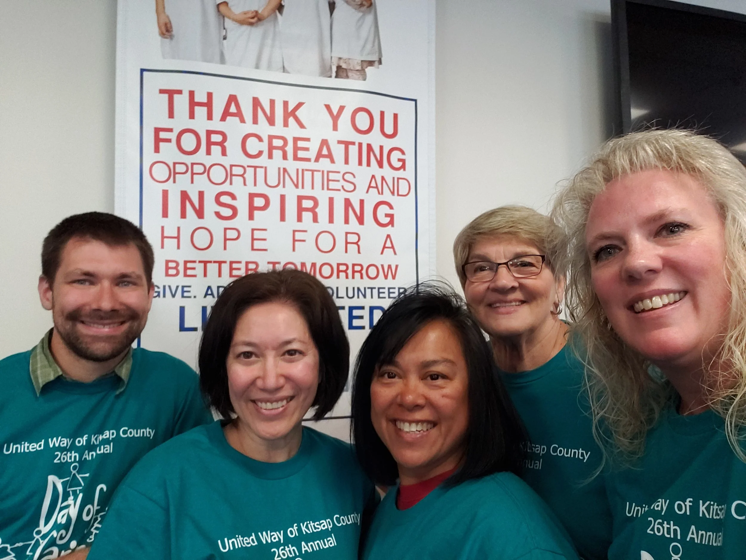 Anton with the amazing volunteers from Columbia Bank during a kit assembly party for the Kitsap County United Way’s Day of Caring