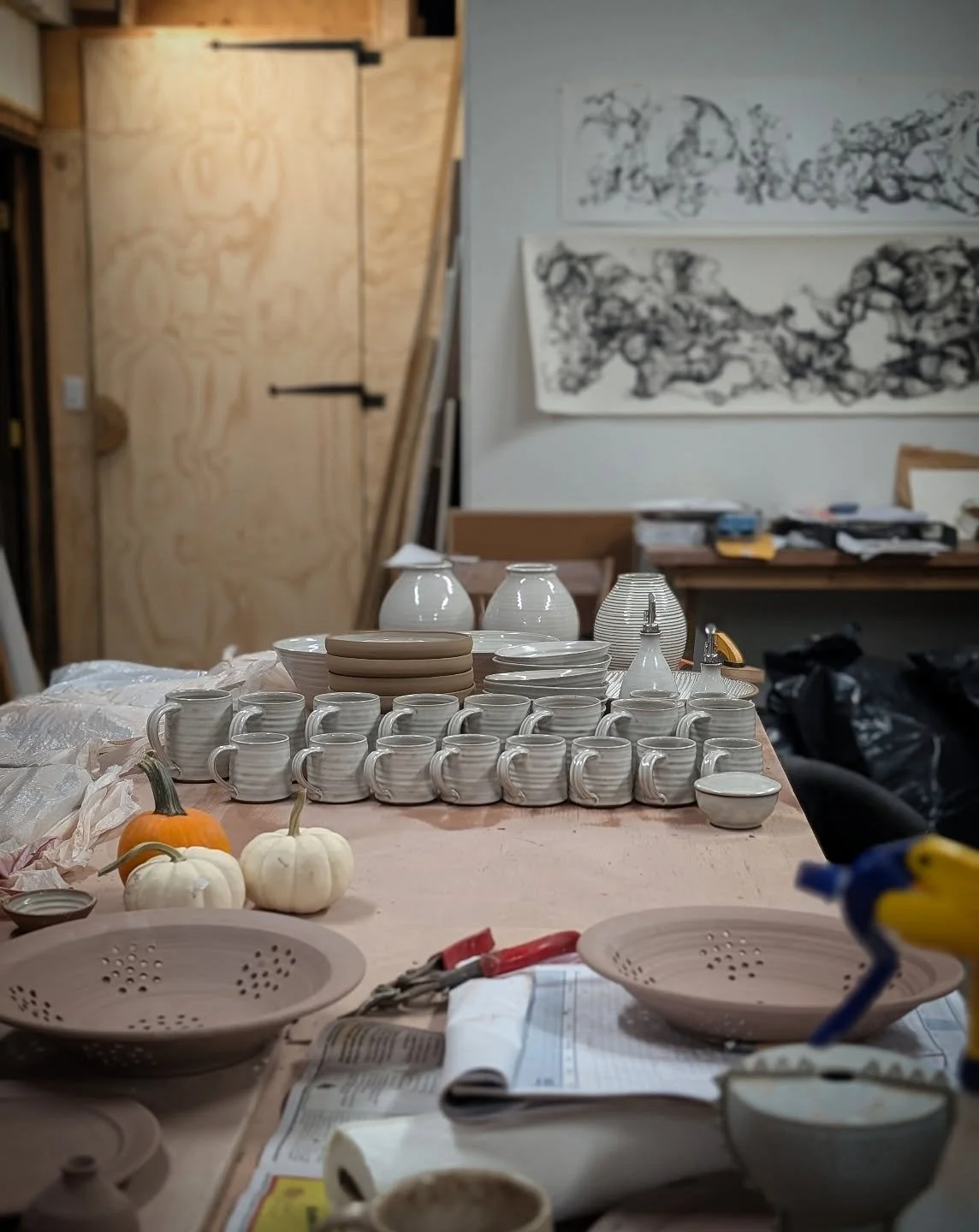 The studio is a little chaotic lately.  I don't usually attend fall in sales because it's a busy time at home and in the studio.  However, I'm thrilled that I did venture out.  Lots of pots found homes and I met some really great people. 

Now it's t