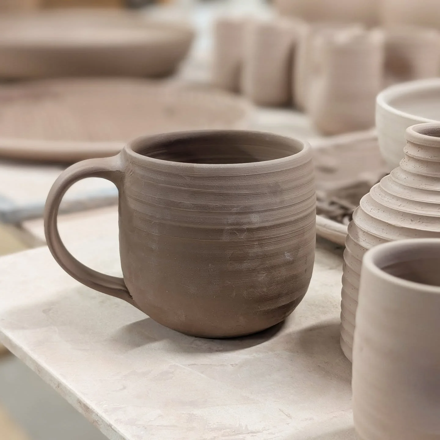 Someone was recently asking me what new pots I was making these days and I got a little stressed.  Yes I do have new shapes that I've been playing with but mostly I'm refining pots that I've made for years.  Then I have that panic feeling, are people