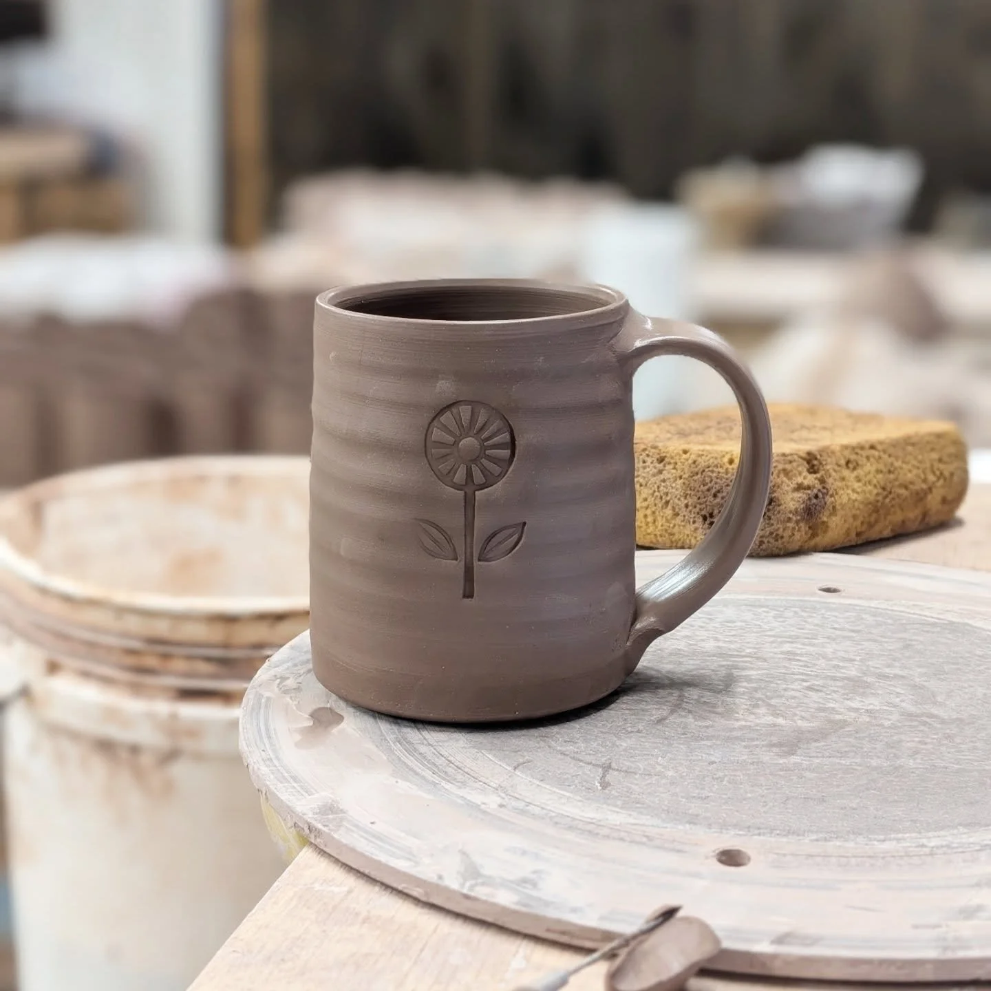 Making flower mugs and vases for @woodysmercantile this week.  Spring is coming (despite the snow forecasts 😳).