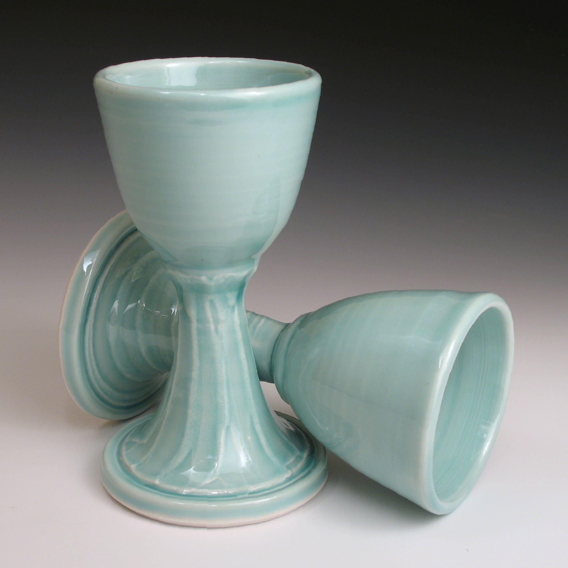 Porcelain goblets with celedon glaze fired to cone 6 oxidation