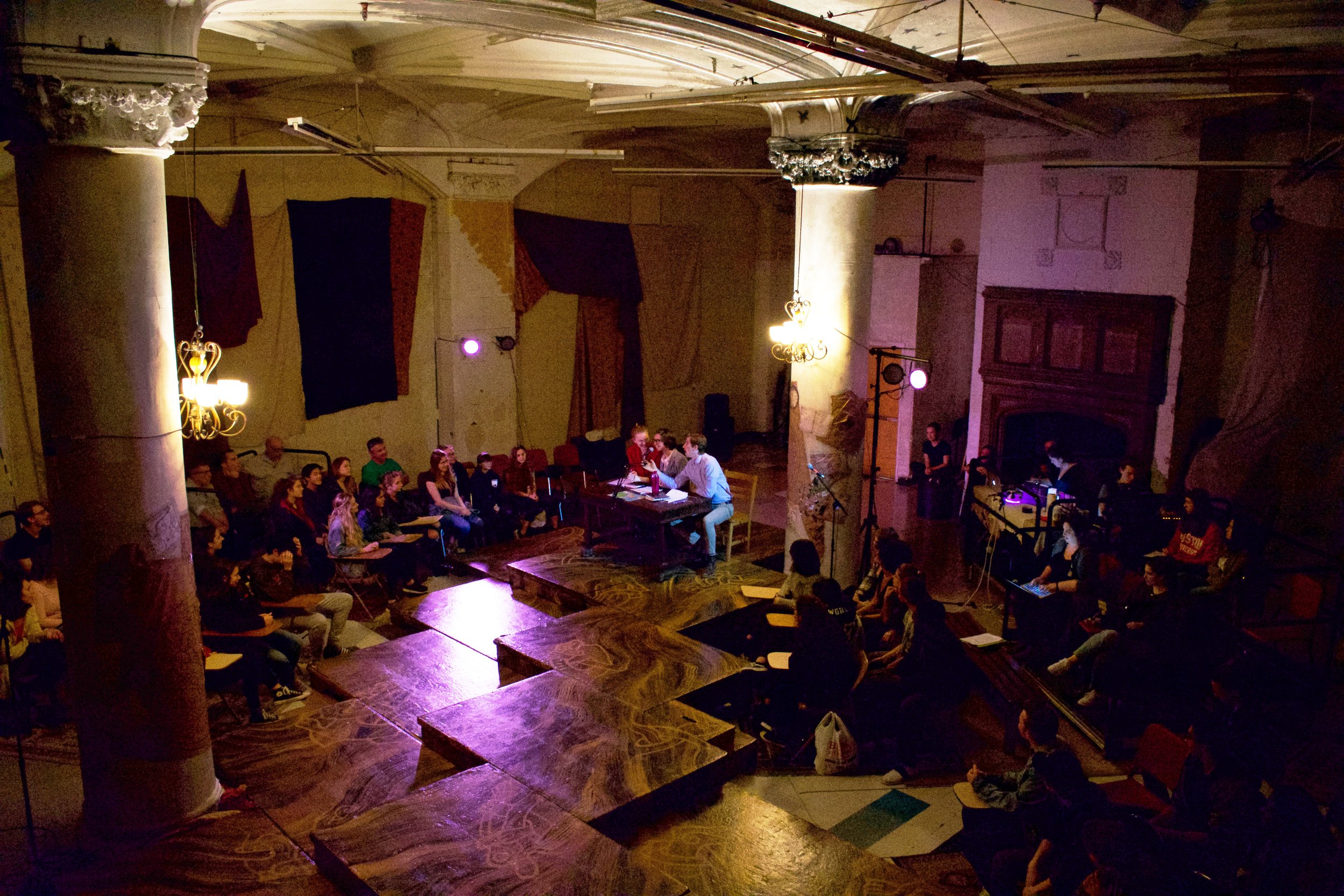  View from the staircase of the audience and the Three Academics at the beginning of the show 