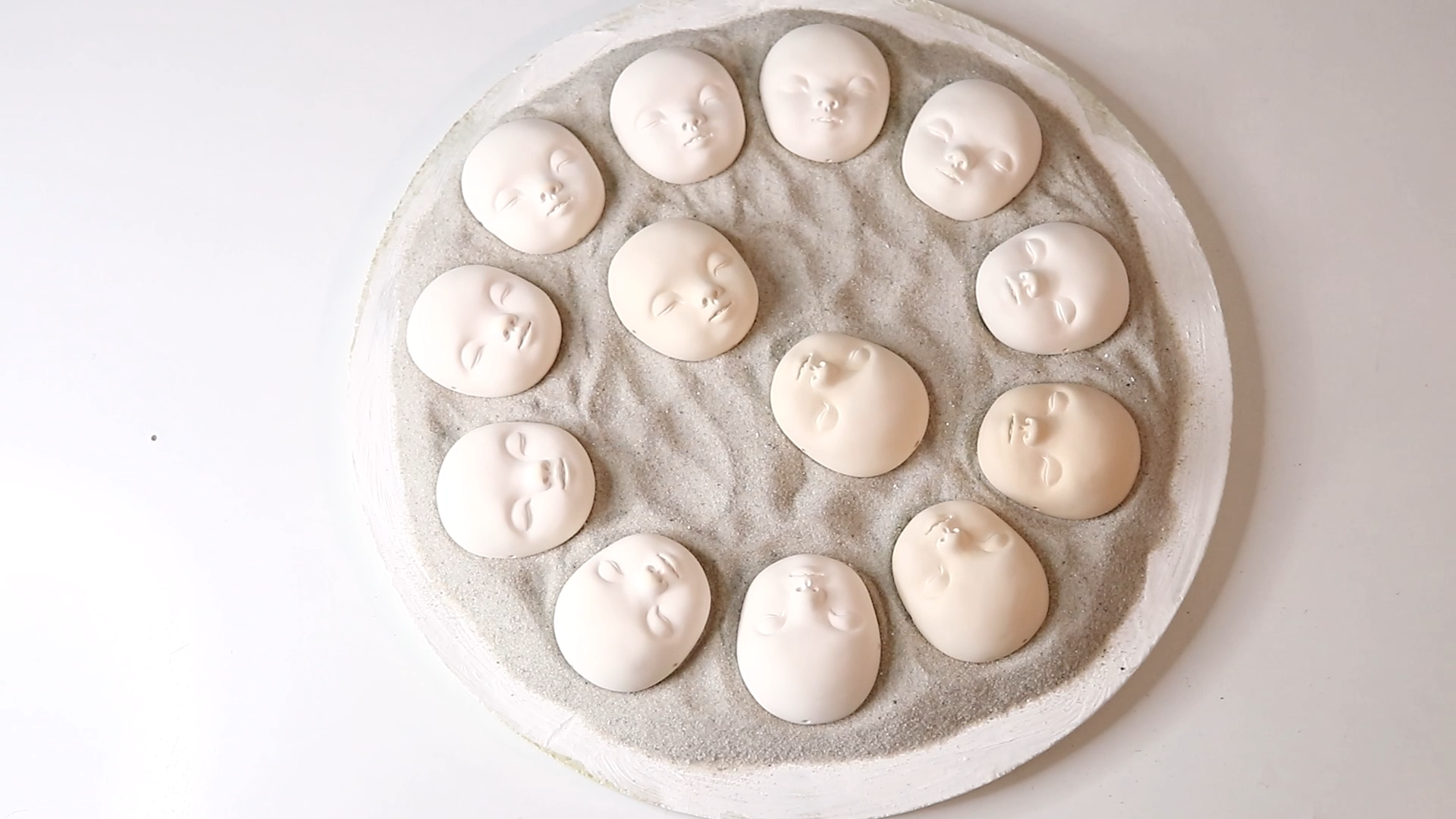 Faces ready for the final firing