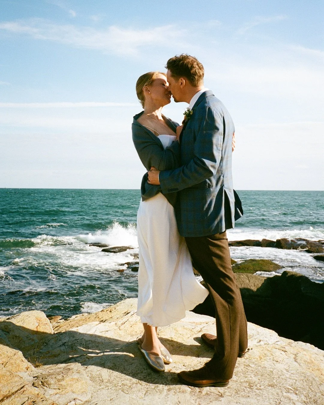 Angela and Adam&rsquo;s wedding at Beavertail Lighthouse was as intimate as it was beautiful and left us feeling grateful to live in such a creatively inspiring place. After a quick ceremony by the water we spent some time crawling around on the rock