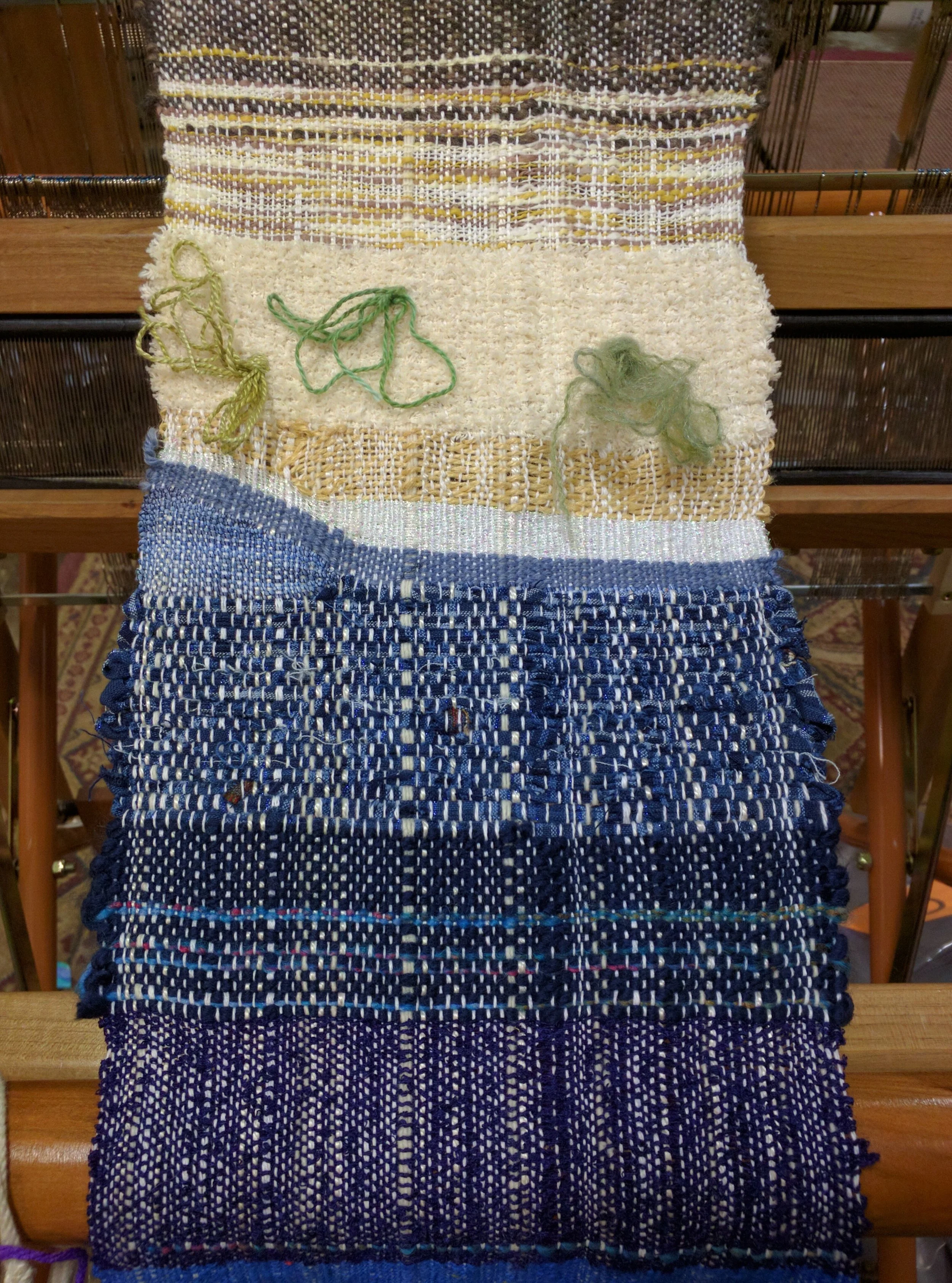 Part of a longer piece of nature-inspired tapestry weaving done on a self-wound warp and given to my late father, 2016.