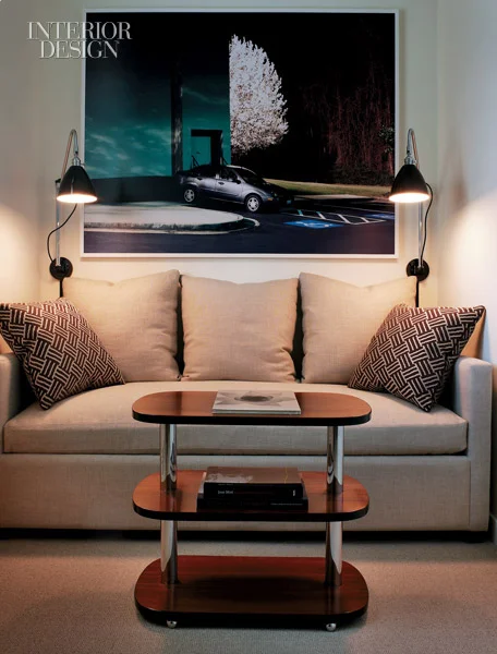 344849-Above_the_bedroom_s_custom_sofa_bed_are_chromed_sconces_with_enameled_metal_shades_Photograph_by_Eric_Laignel_.jpg
