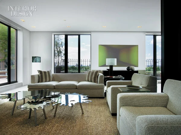344846-Laid_over_the_bleached_pickled_oak_floor_a_custom_sisal_rug_anchors_the_living_area_Photograph_by_Eric_Laignel_.jpg