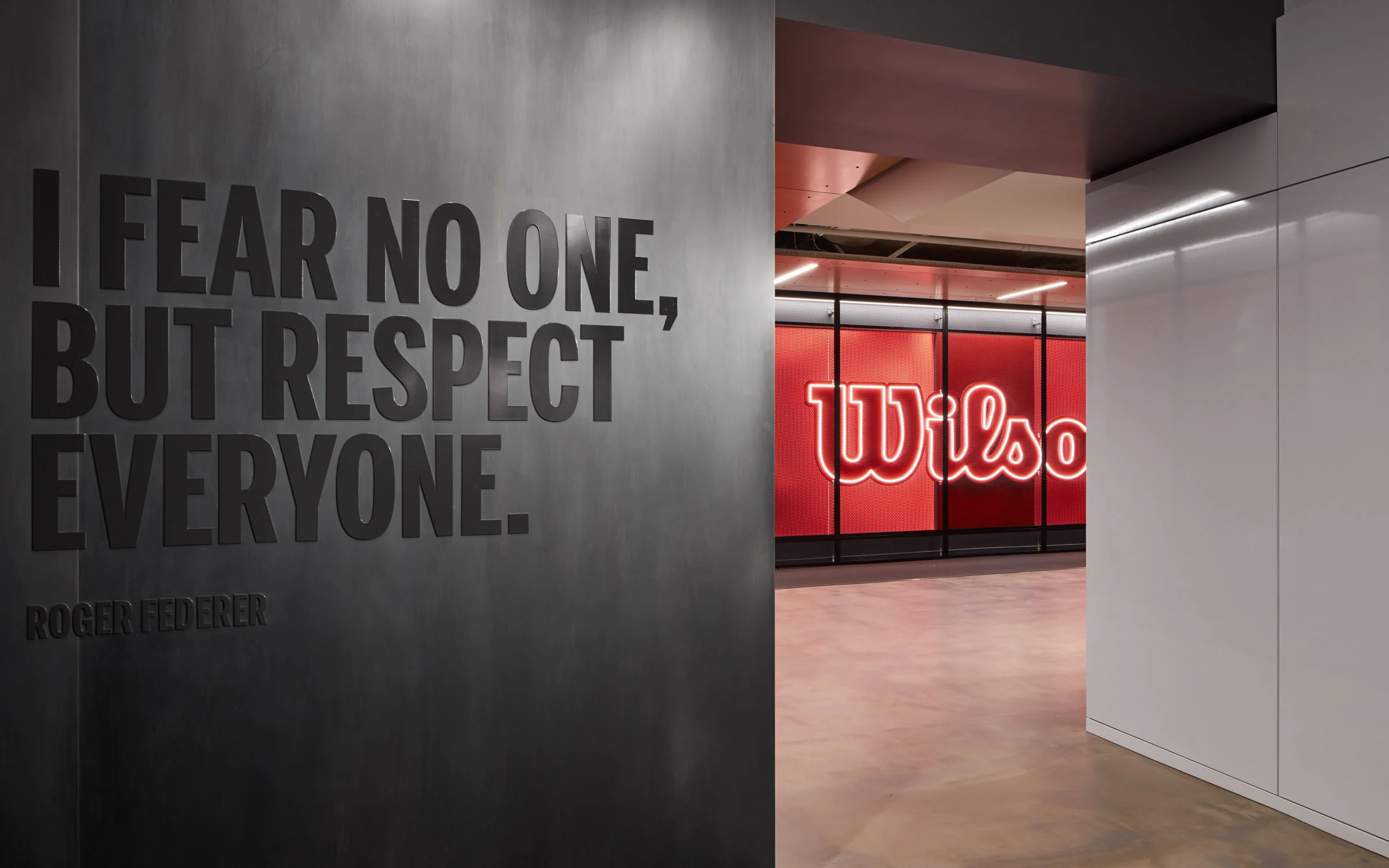 One of the world’s best-known sports equipment brands, Wilson made the decision to move their HQ from suburban to downtown Chicago — doubling-down on their commitment to the city and to be in a better location from which to connect with their core, urban-oriented customers. The Wilson brand comes to life throughout the space, riffing on the urban context both architecturally and also with the material choices for the environmental graphics — the central story being one of connection: the brand to the city, and of the athlete to her equipment.
