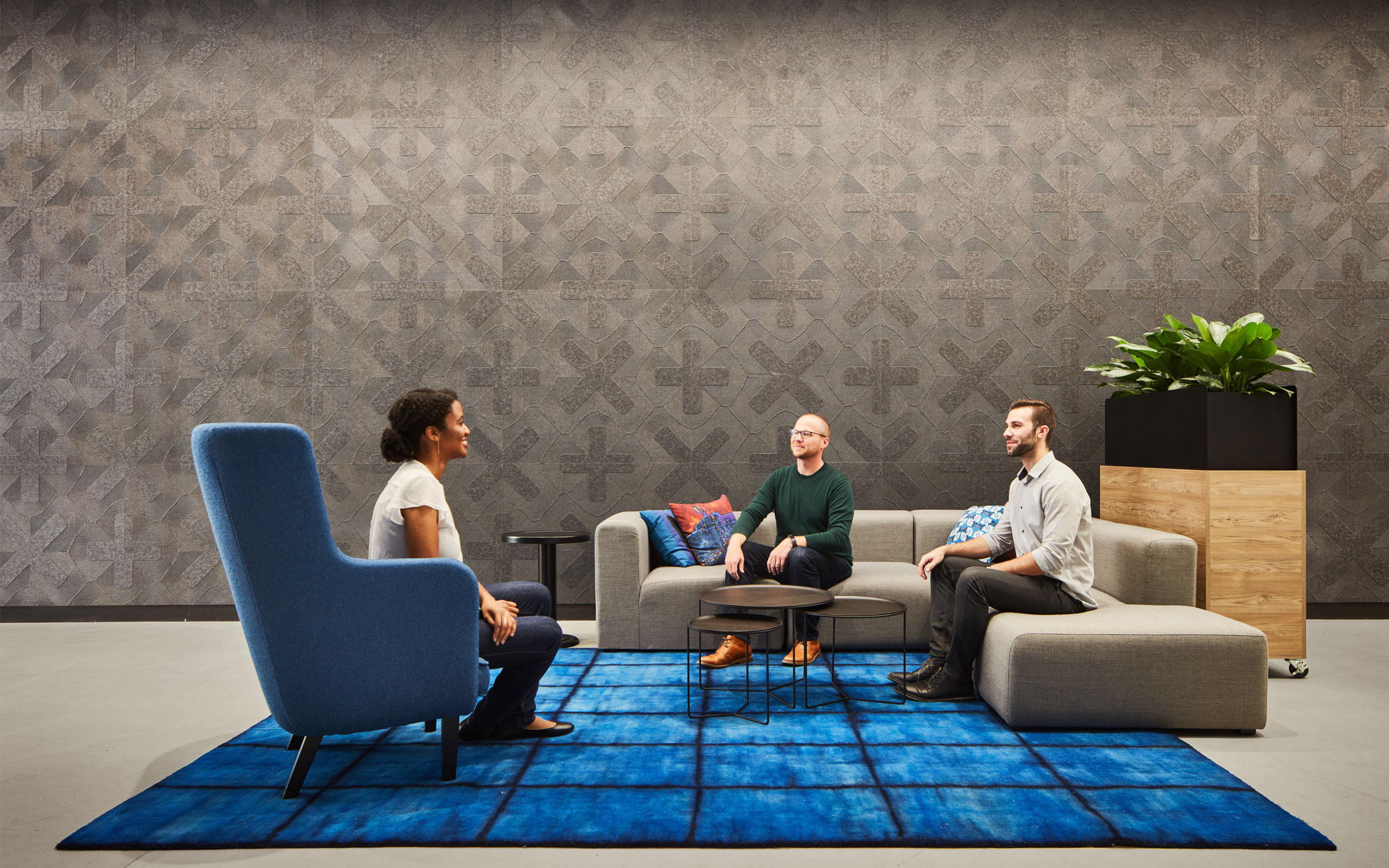 Material choices were key in many of the open areas of the office die to both the size of the space and the proliferation of hard surfaces — printed and routed felt is a feature motif for conveying aspects of the LinkedIn brand story in the ground floor event space.