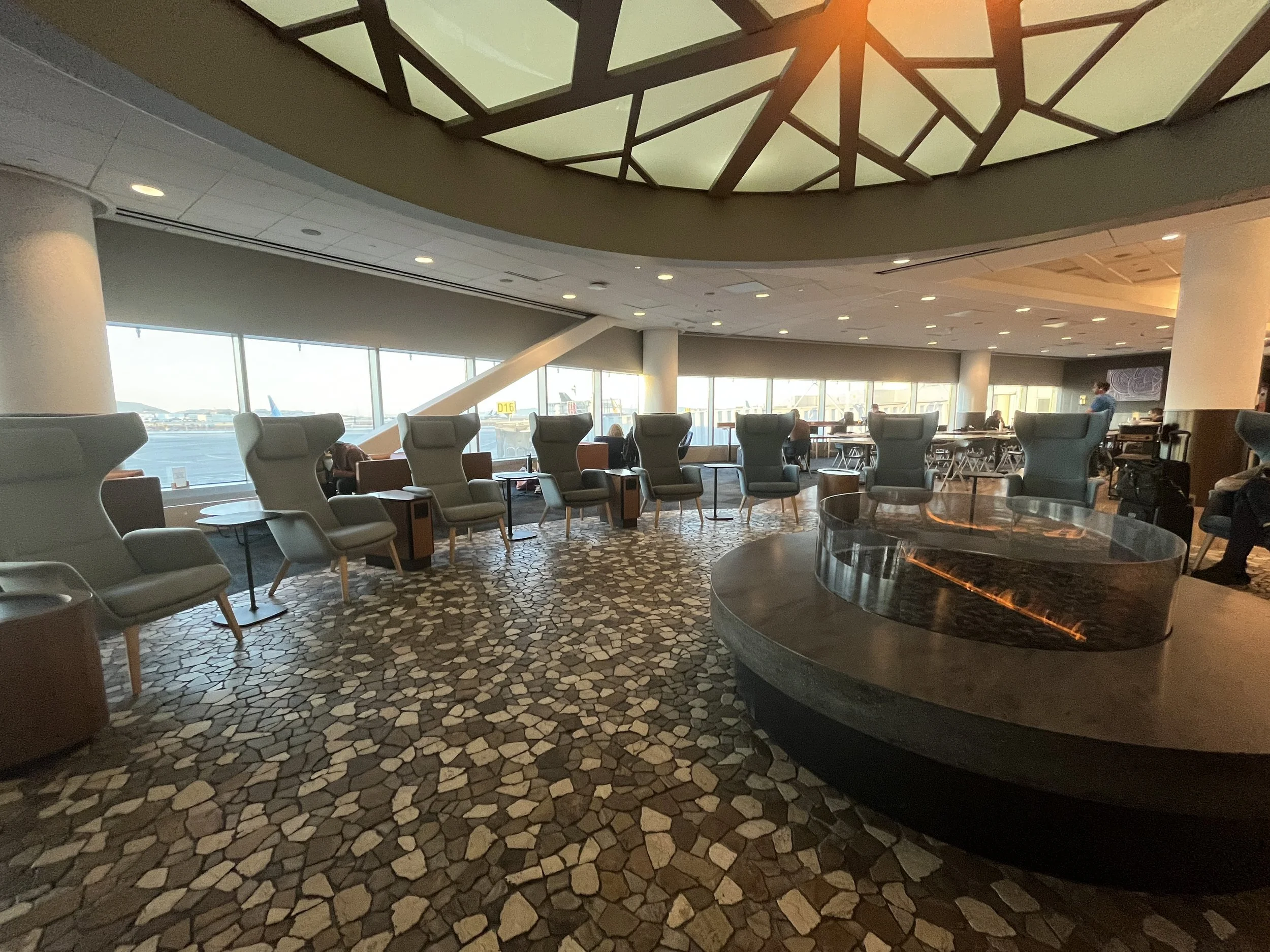 Roaming Cactus authors relaxing in premium airport lounge thanks to best travel credit cards 2026 perks and redemptions