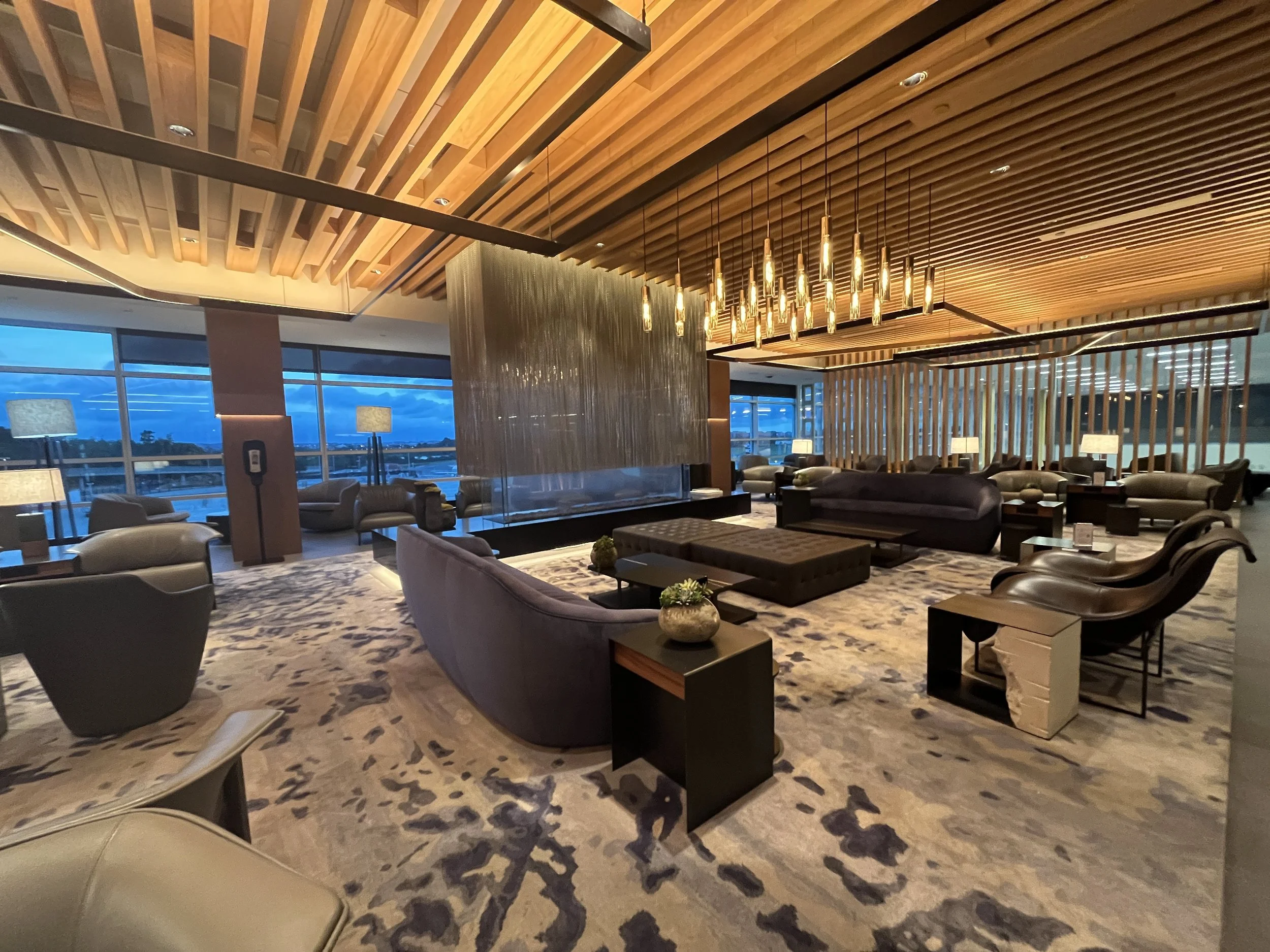 Luxury lounge access after booking entire trip with points from best travel credit cards 2026