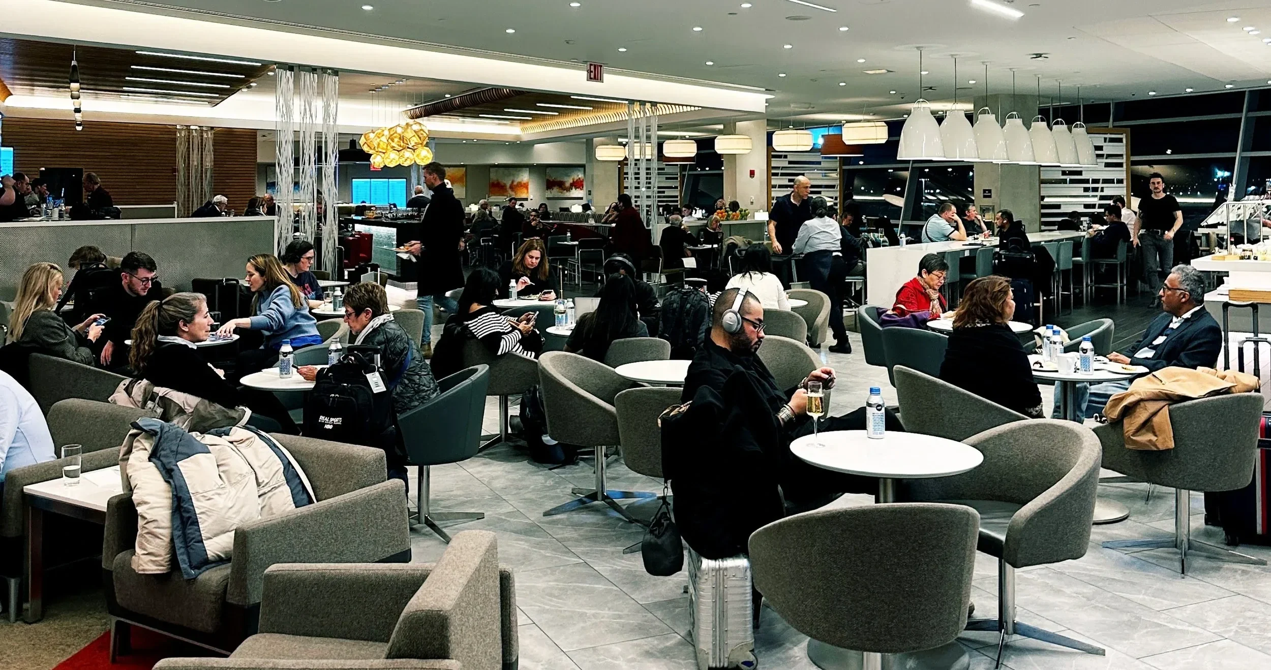 Busy Greenwich Lounge - American Airlines Lounges at JFK Terminal 8 in 2026