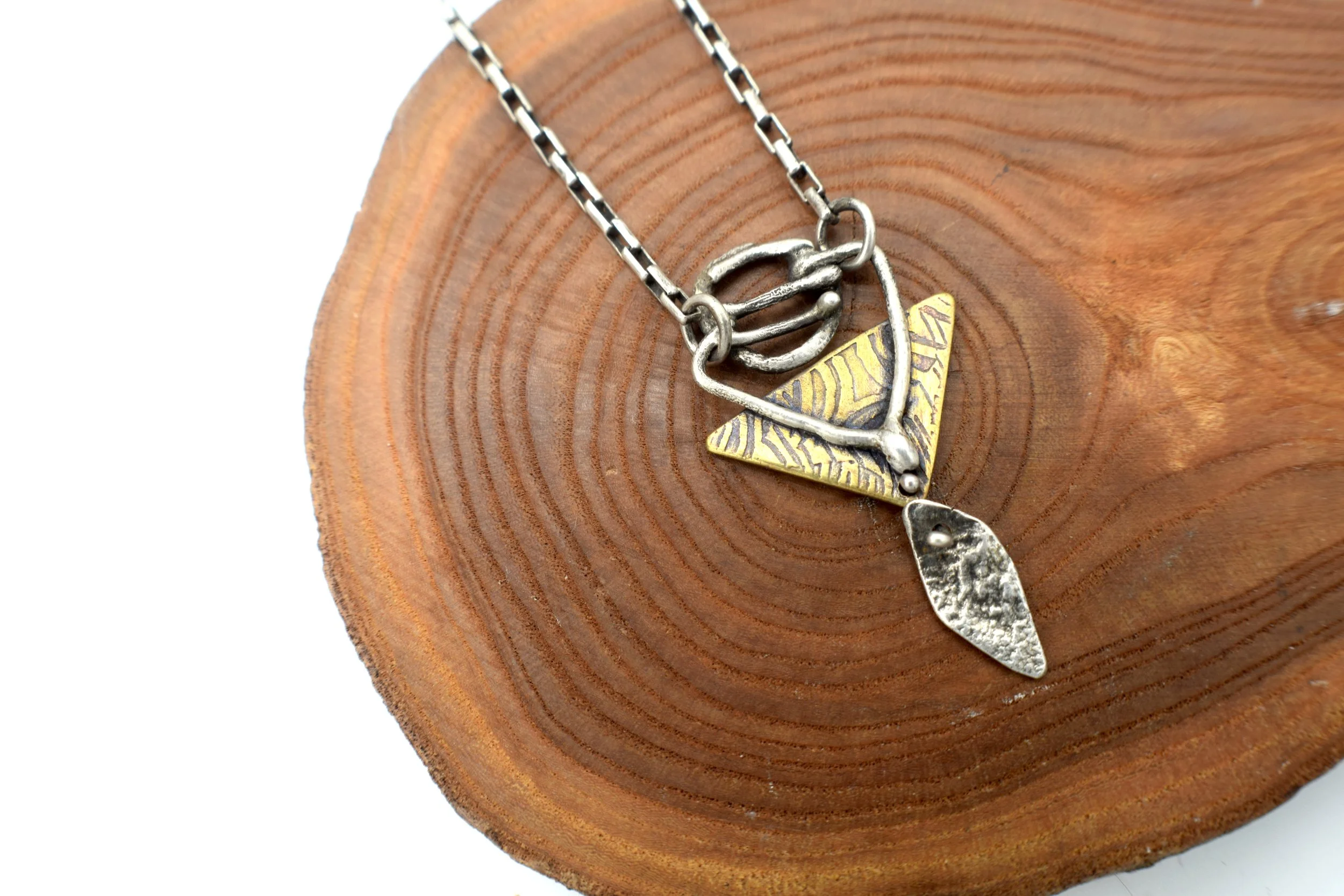 brass_etched_silver_triangle_neclace.JPG