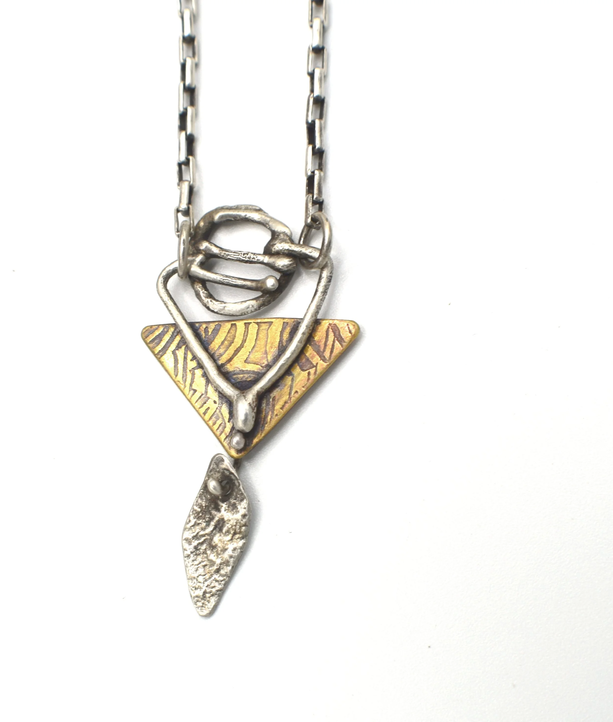 brass_etched_silver_triangle_neclace2.JPG