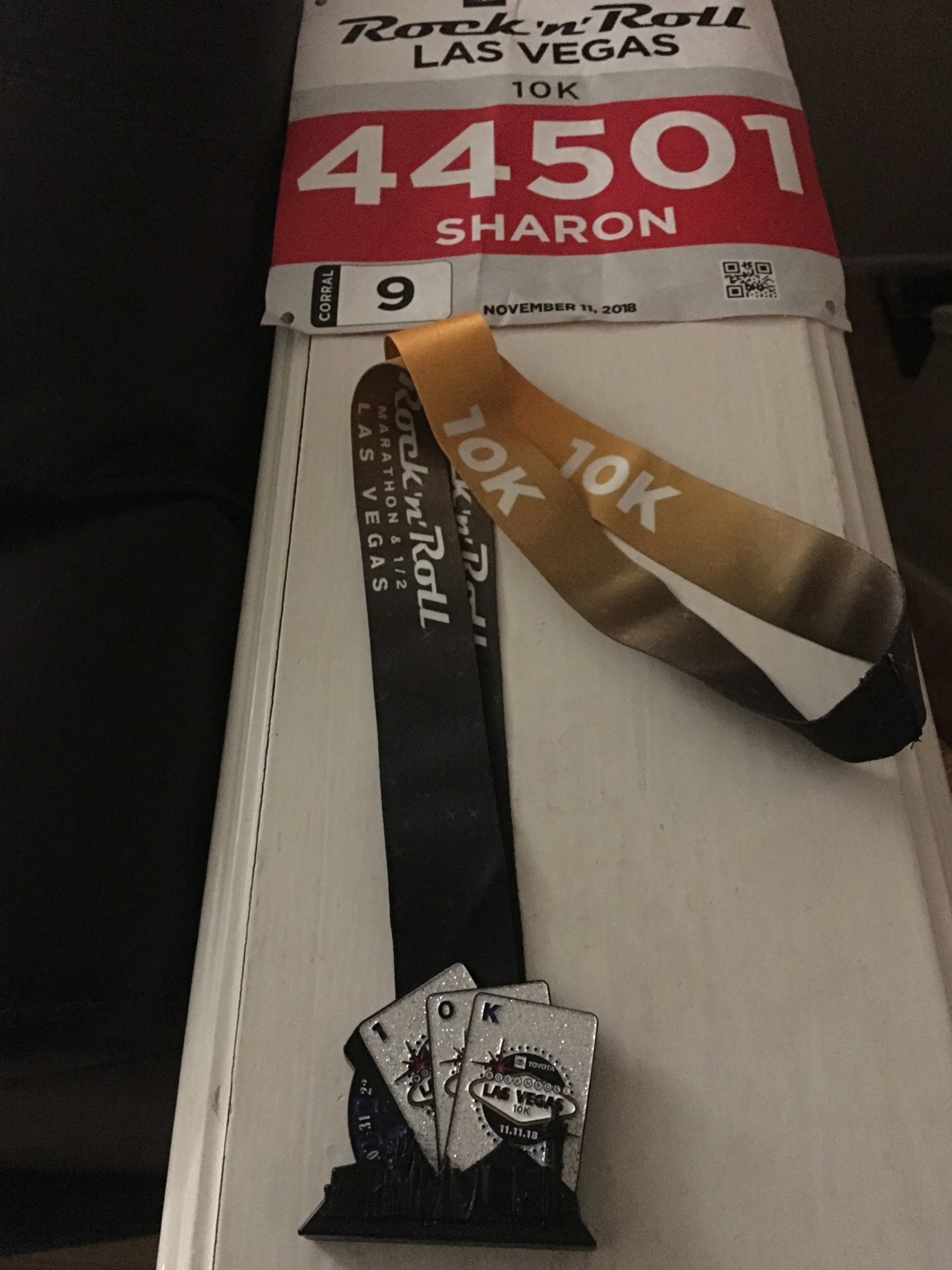 Race bib and 10k medal