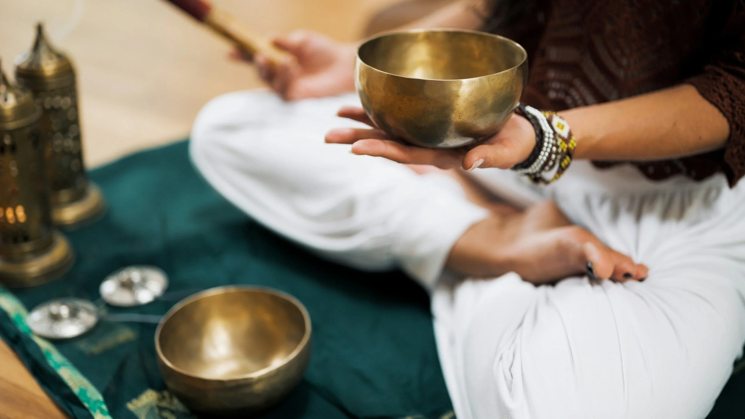 Nicolas Sotomayor, Beverly Hills sound practitioner, performing a private sound bath with Himalayan and crystal singing bowls for meditation and wellness.