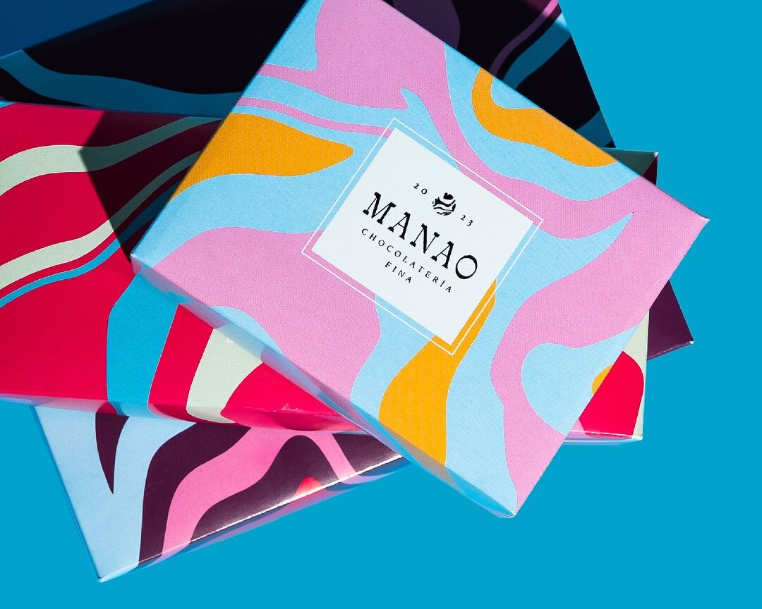 Manao&rsquo;s brand is born from the rich flavorful notes found in the cacao they use. These are expressed colorfully and with a playful twist, giving Manao the fun vibrant personality they were looking for. #brandingstudio #packaging #chocolatepacka
