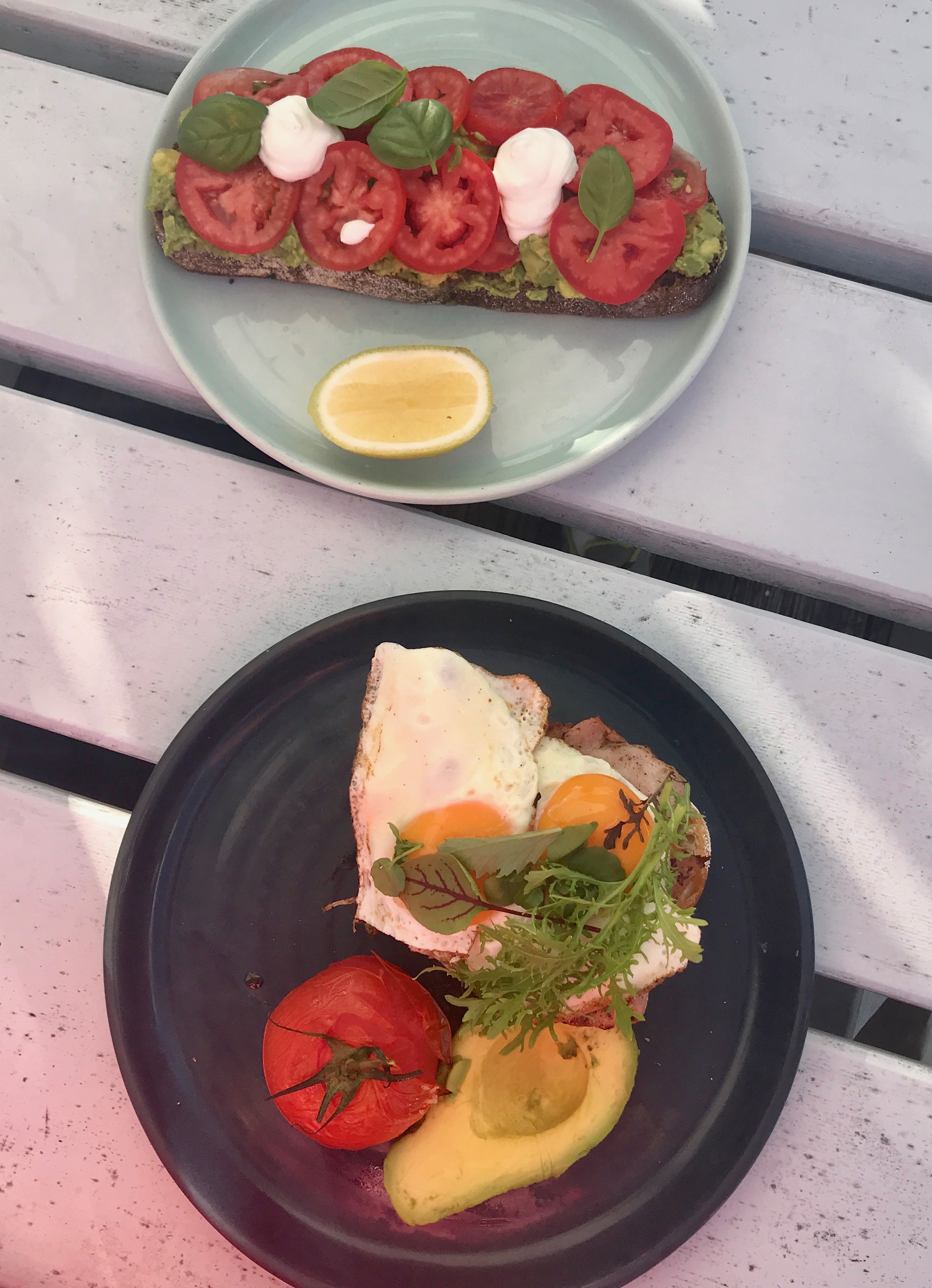 Top: Avocado Toast with Tomato and Fetta; Bottom: Eggs on Toast with Bacon, Roast Tomato and Avocado