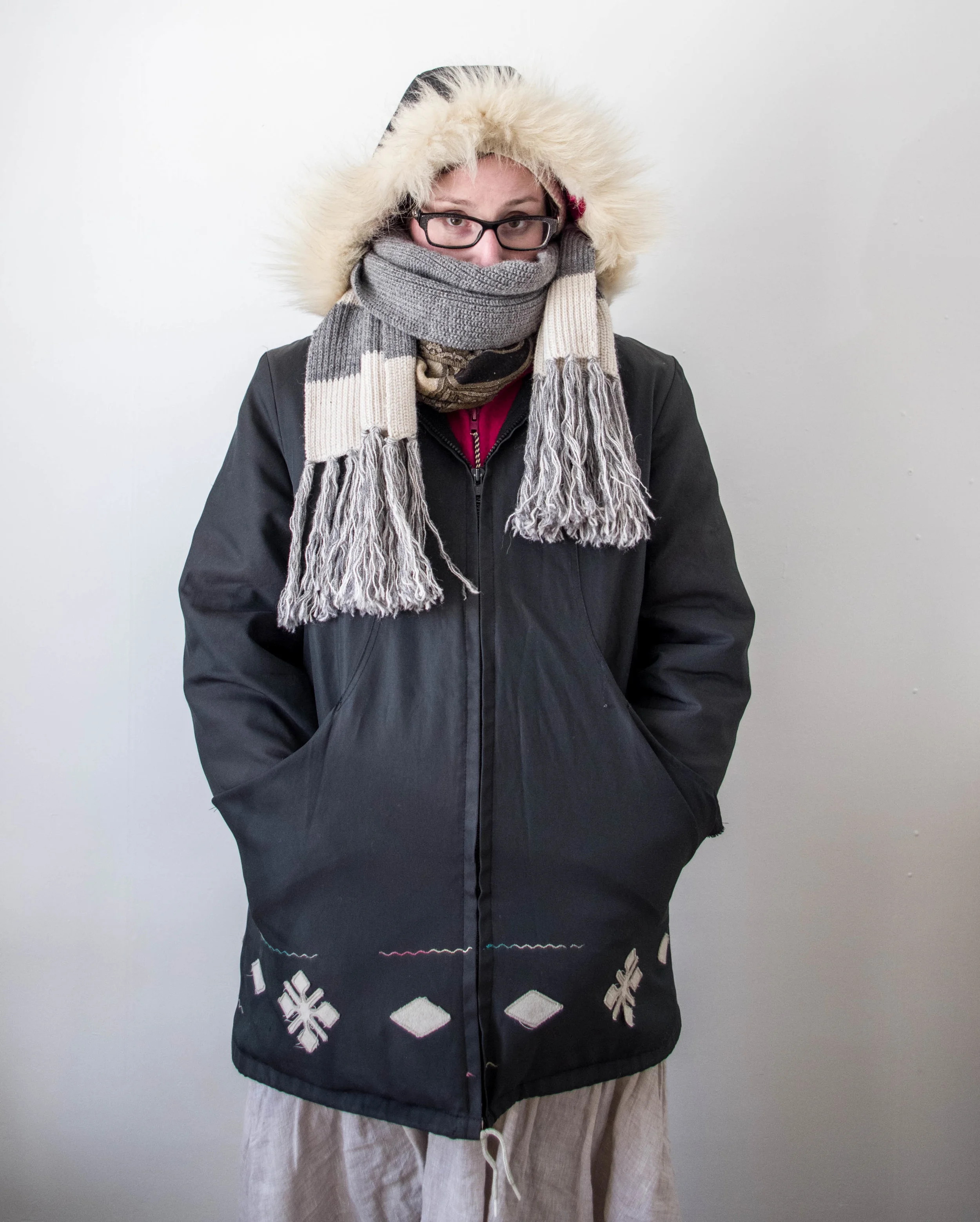 last winter’s aesthetic, which will probably be the same as this winter’s aesthetic - skirts over tights with thick socks on the bottom, three or four torso layers hiding underneath a two-layer parka that my mum bought several decades ago for the north, hands wearing handshoes and big mitts buried in pockets, hat covered by a double-layer hood with fur trim to block some of the prairie wind, pashmina wrapped around the neck and a scarf snagged from bryce covering most of my face. guaranteed my bones will still be cold when we get to this point.