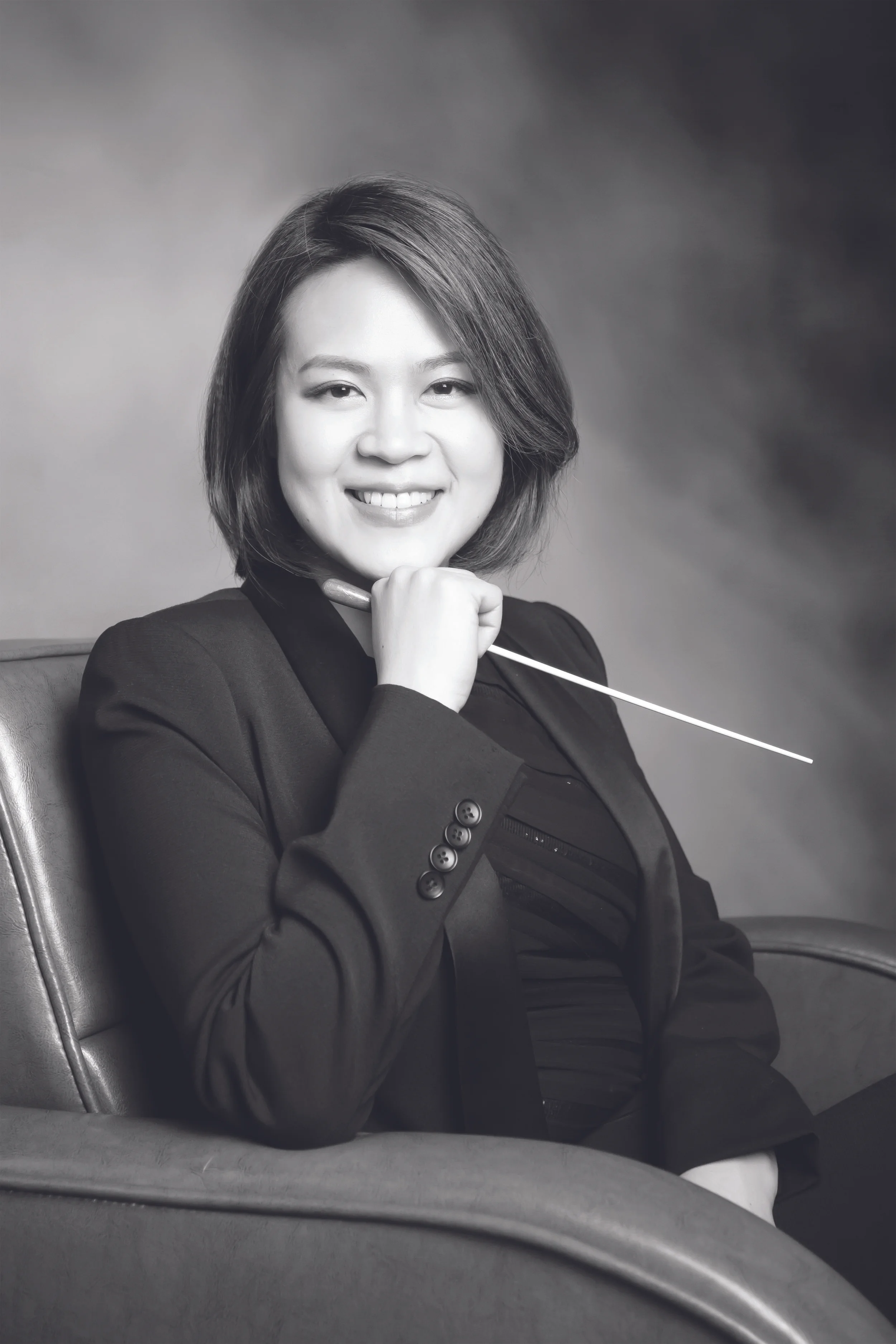 JULIA TAI Music Director of Philharmonia Northwest in Seattle, WA Conductor & Co-Artistic Director of Seattle Modern Orchestra