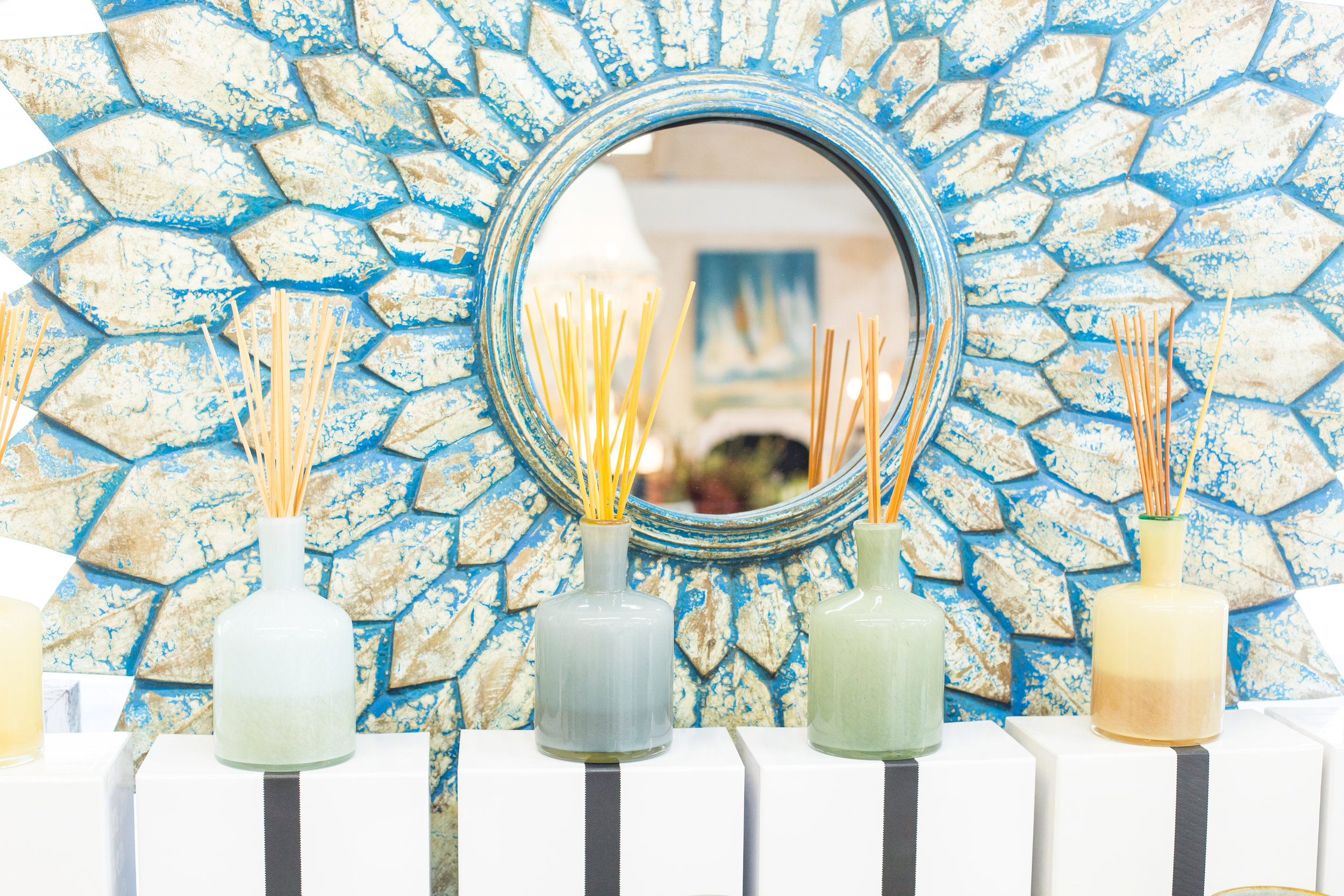 Turquoise mirror, colorful diffusers
